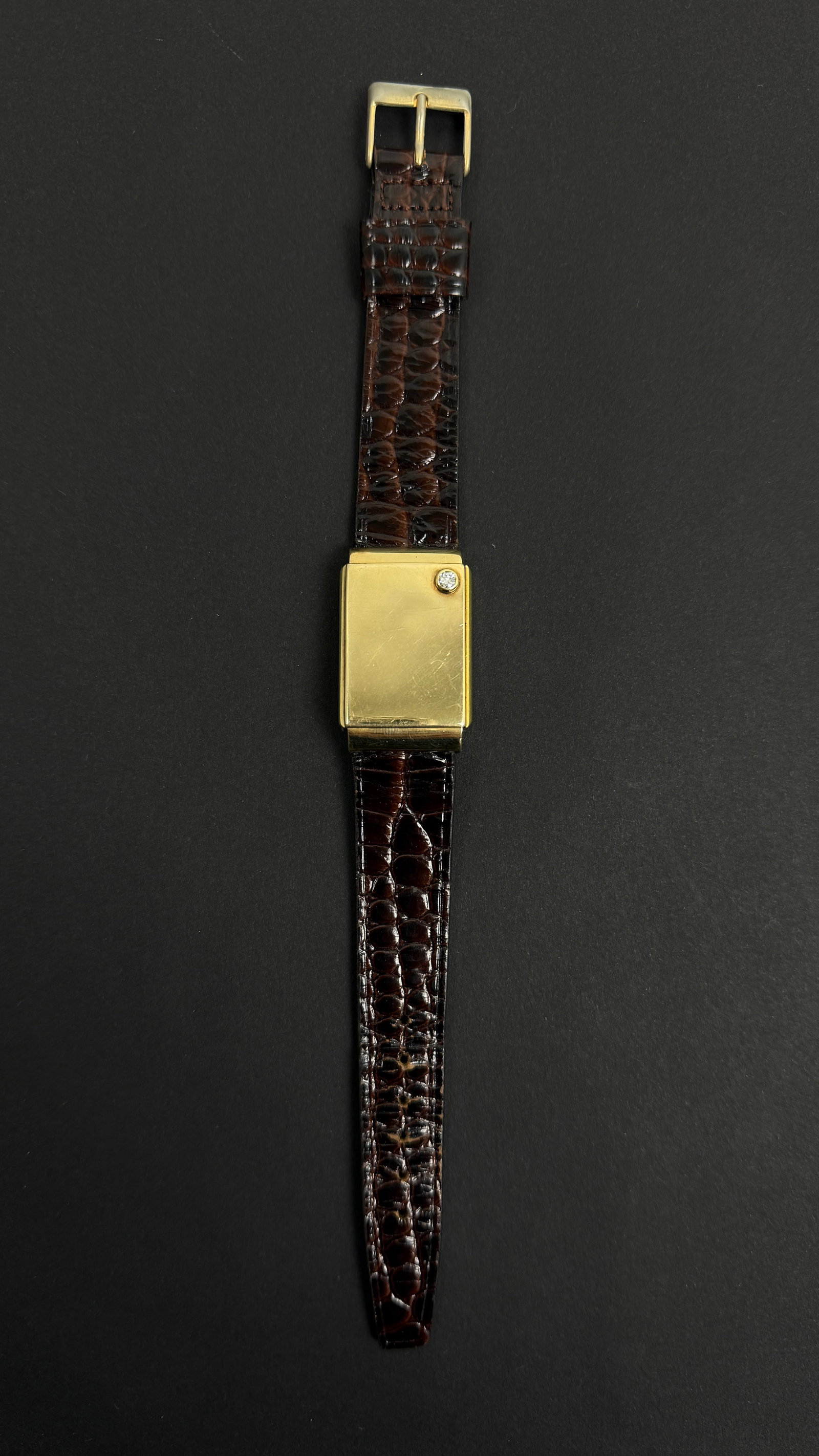14K Gold Tavannes Wrist Watch Hidden Case With Diamond Manual Wind: This exquisite 14K gold Tavannes wristwatch showcases the brand's dedication to innovative design and fine craftsmanship. Featuring a unique hidden dial concealed beneath a diamond-set cover, this tim