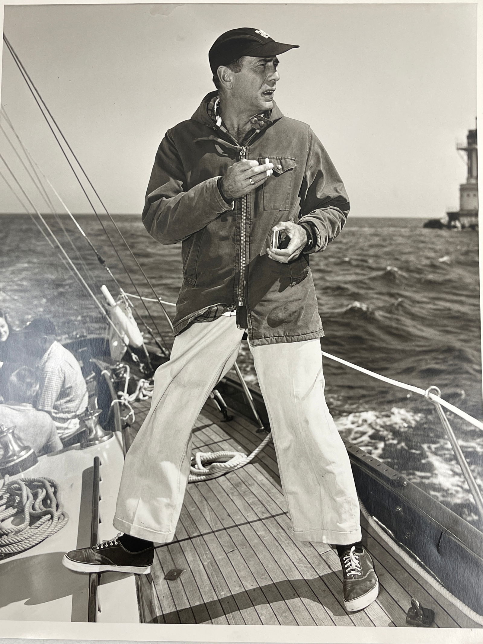 Sid Avery - Original B&W Photograph of Humphrey Bogart Signed: Sid Avery - Original B&W Photograph of Humphrey Bogart Signed on Verso in Pencil 'Sid Avery'. Stamp dated 1952. Copyright Sid Avery Stamp on Verso. Size: 16" x 20". FROM A PRIVATE CALIFORNIA COLLECTIO