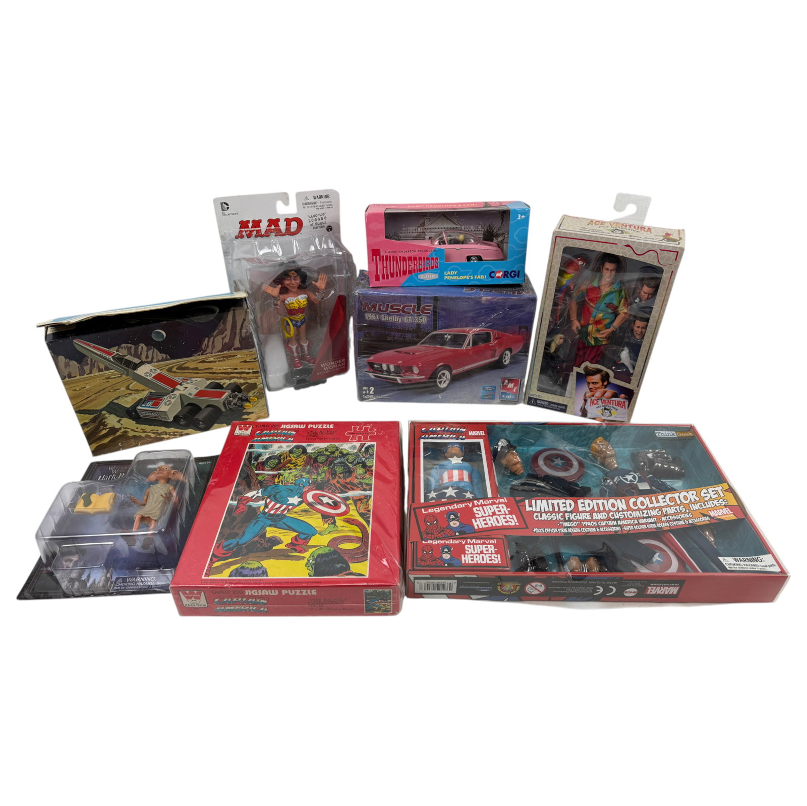 Action Figures An Collectibles Ace Ventura Pet Detective And Captain America: Includes Ace Ventura Pet Detective Figurine And Mad Figures Wonderwoman, An Captain America
