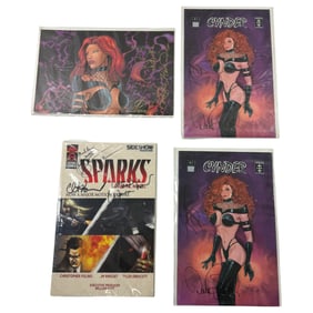Authentic Signed Cynder comics and a Sparks graphic novel with certificates