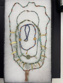 Ancient Stone and Bead Necklaces with Amulets