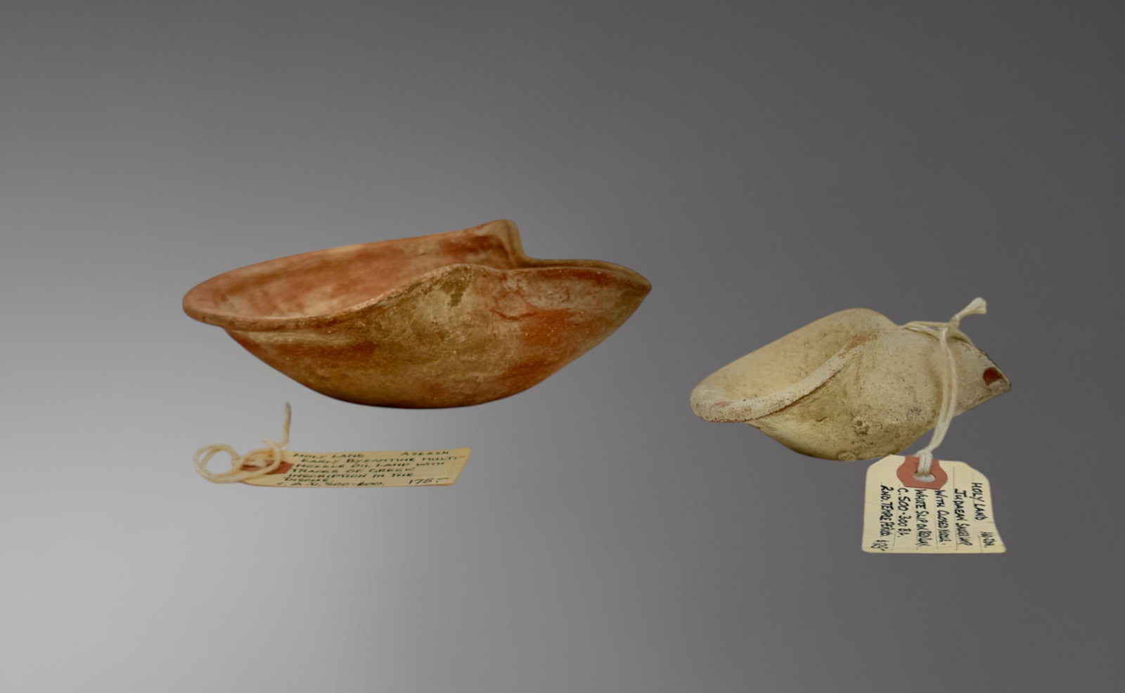 Pair of Holy Land Terracotta Pinch Pots – 1st Century BC: A matched pair of terracotta pinch pots from the Holy Land, dating to the 1st century BC. These vessels were shaped by hand using traditional pinch techniques, resulting in simple, open bowl forms wit