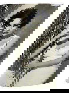 Elizabath Taylor - Original Photograph from Cat on a Hot Tin Roof: Elizabath Taylor - Original Photograph from Cat on a Hot Tin Roof. Insribed on verso. Size: 11" x 14".