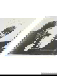 John Lennon Signed Black and White Photograph: John Lennon Signed Black and White Photograph. Size of photo: 8" x 10".