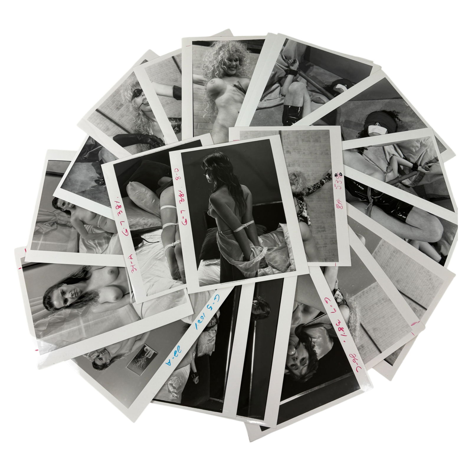 Vintage Erotic Nude Bondage ADULT Photo Collection Movie & Magazine: This rare collection features originalproduction photographs from vintage bondage-themed erotic films and magazines. The lot includes candid and posed scenes from photo shoots, showcasing models in st