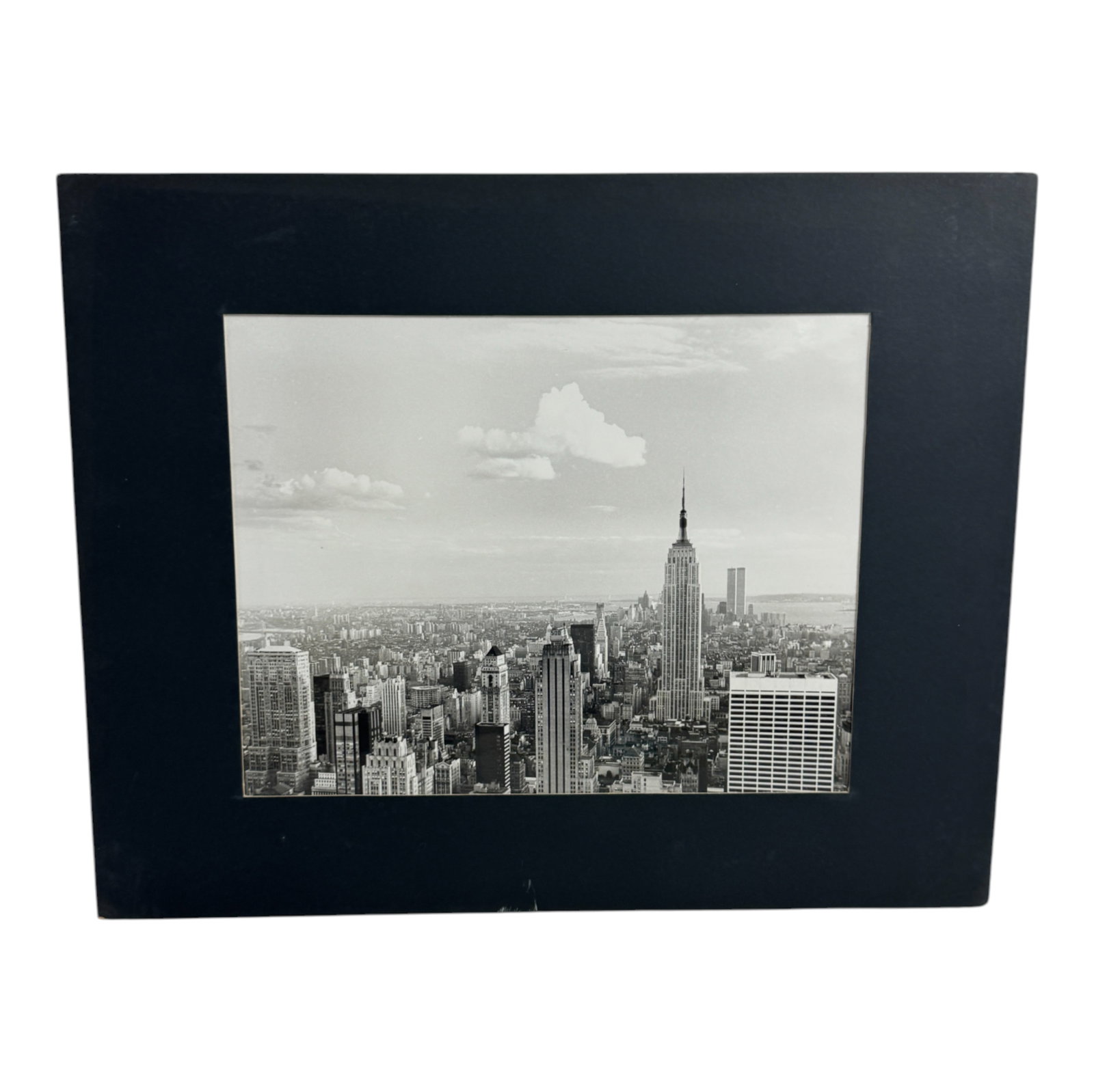 George Forss Photograph - New York Skyline: Iconic view of New York skyline with Empire State Building, mounted. New York Skyline: An iconic view of the New York skyline featuring the Empire State Building, mounted for display. This quintessent