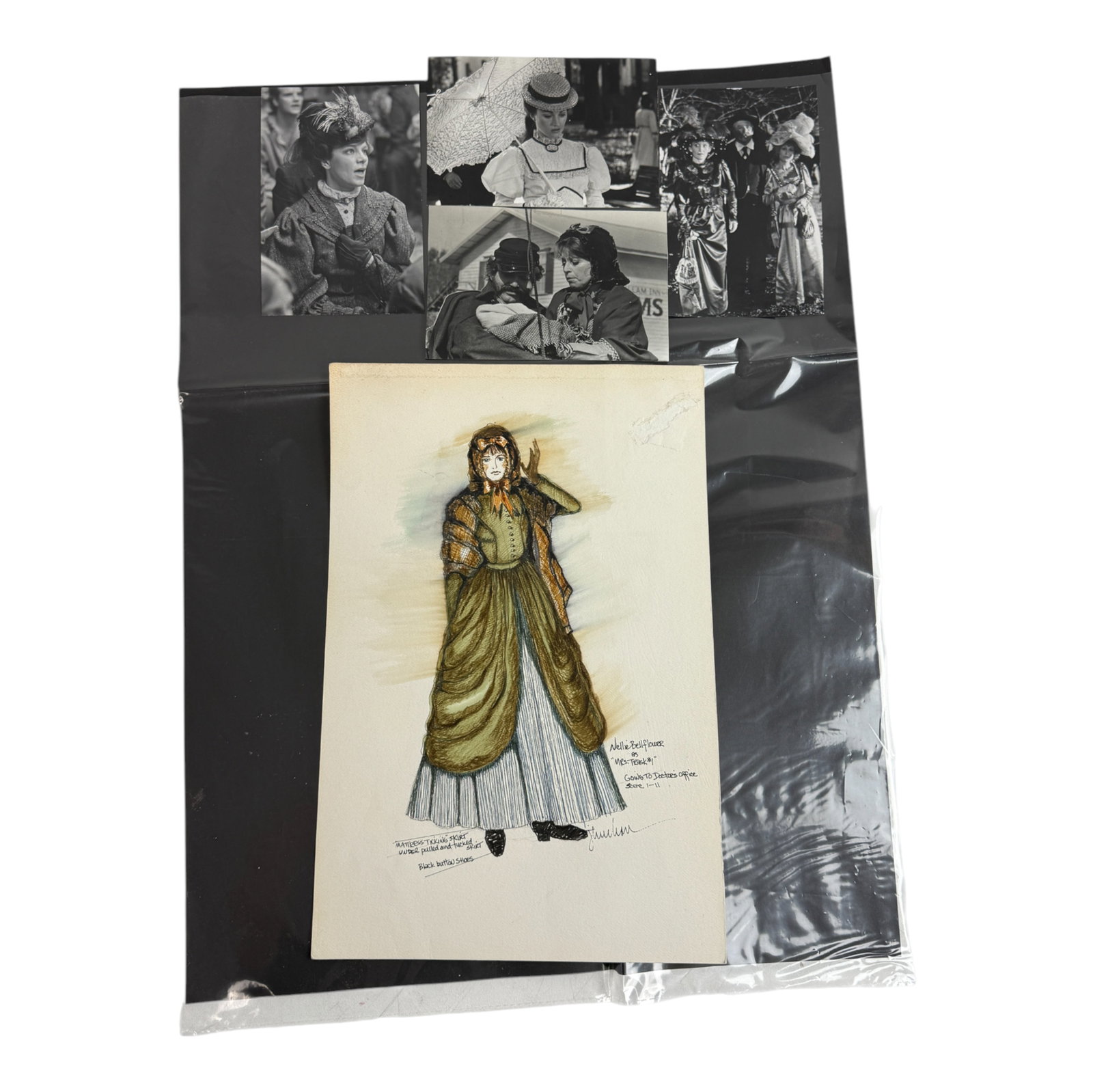 Costume Design Artwork & Photos: Original costume design sketch with related production photographs. Includes detailed character drawing and black-and-white reference images. A unique collectible for film and theater enthusiasts.