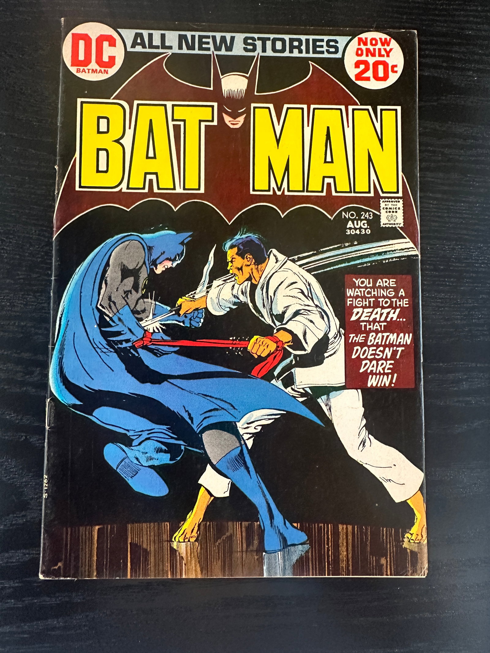 Batman #243 — Batman vs Martial Artist (1972): Batman #243 featuring Batman battling a martial artist in a deadly duel.