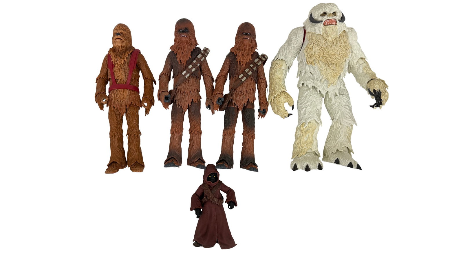 Star Wars Wookiee & Wampa Figure Lot: Star Wars figures including multiple Chewbacca figures, a Jawa and a Wampa creature.