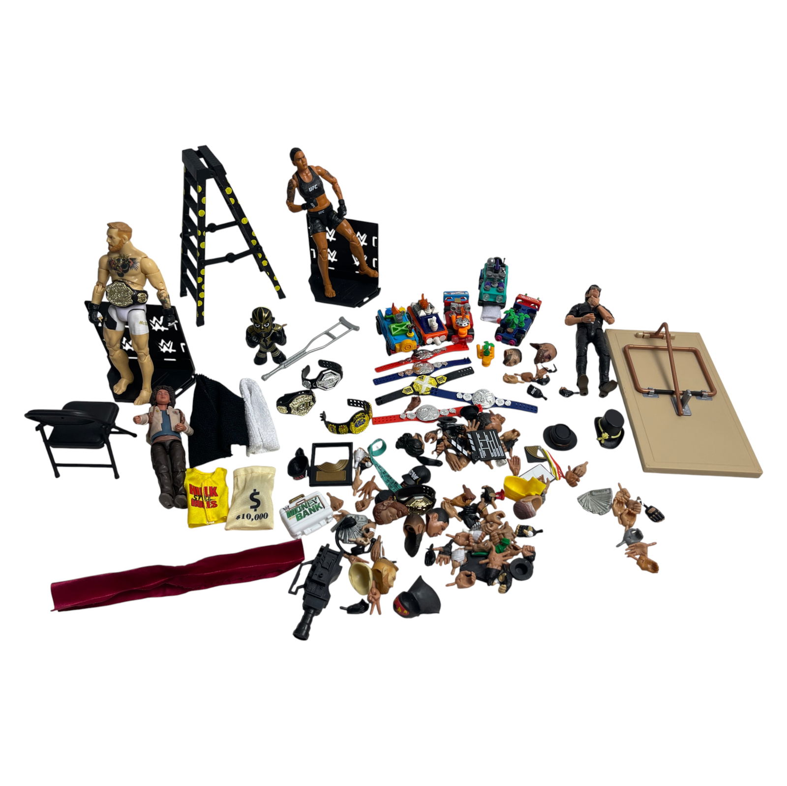 Lot of Wrestling Accessories and Figures: Lot of wrestling action figures, accessories, and belts. Private collector item, vintage estate collectible.