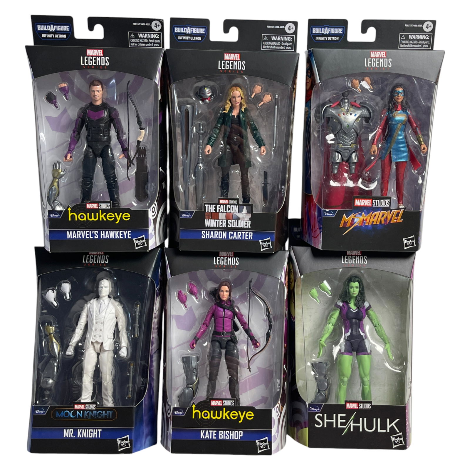 Marvel Legends Figures Lot: Lot of six Marvel Legends action figures in original packaging. Includes Hawkeye, Sharon Carter, Ms. Marvel, Moon Knight, Kate Bishop, and She-Hulk. Highly detailed and collectible figures.