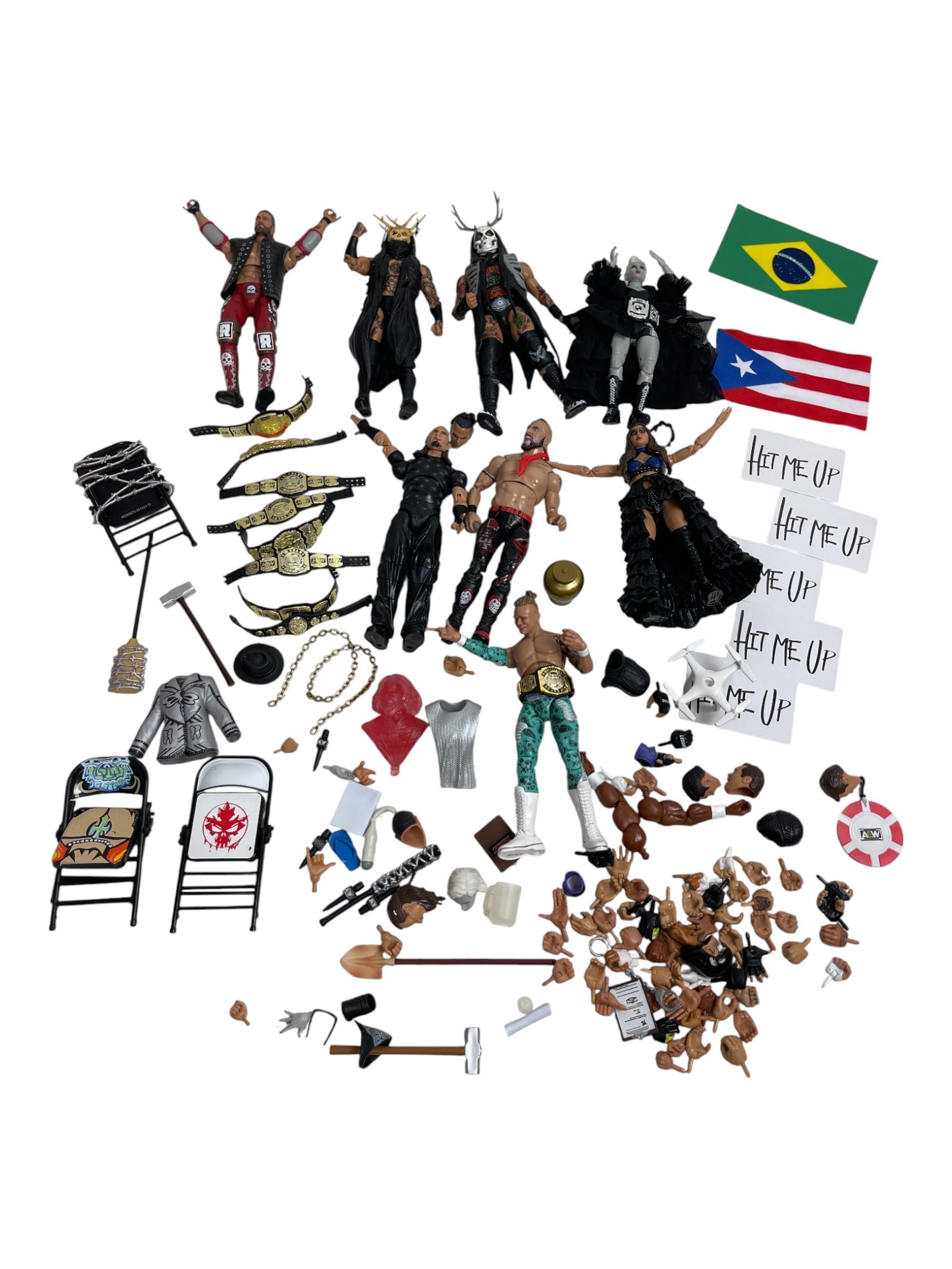 Wrestling Figures with Accessories Lot: Collection of wrestling action figures with belts, chairs, flags, and accessories. Includes multiple wrestlers in ring attire with display props.