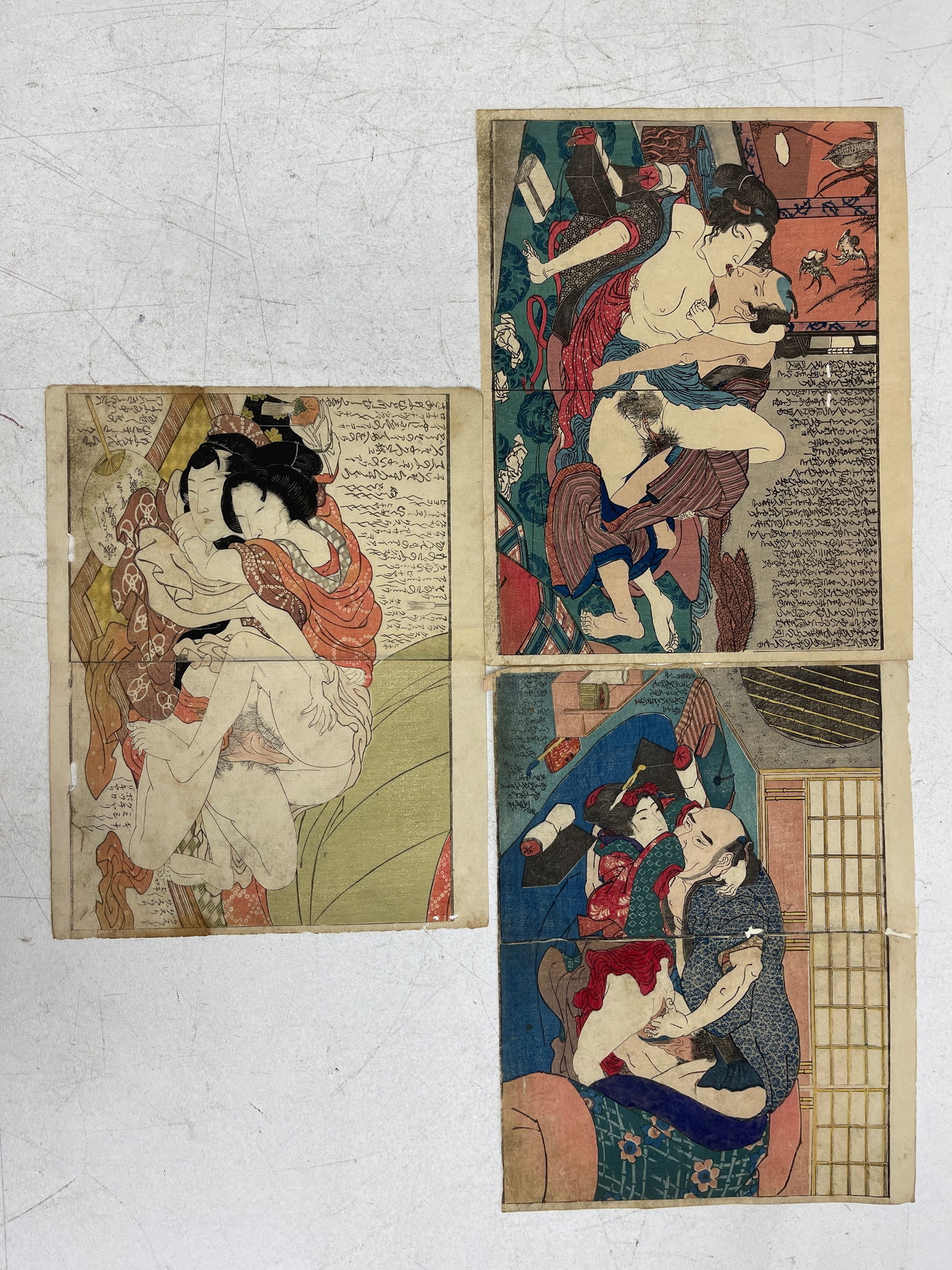 Antique Japanese Shunga Woodblock Prints Lot 1: Lot of three antique Japanese Edo-period shunga erotic woodblock prints, hand-colored with calligraphy inscriptions. Private collector item.