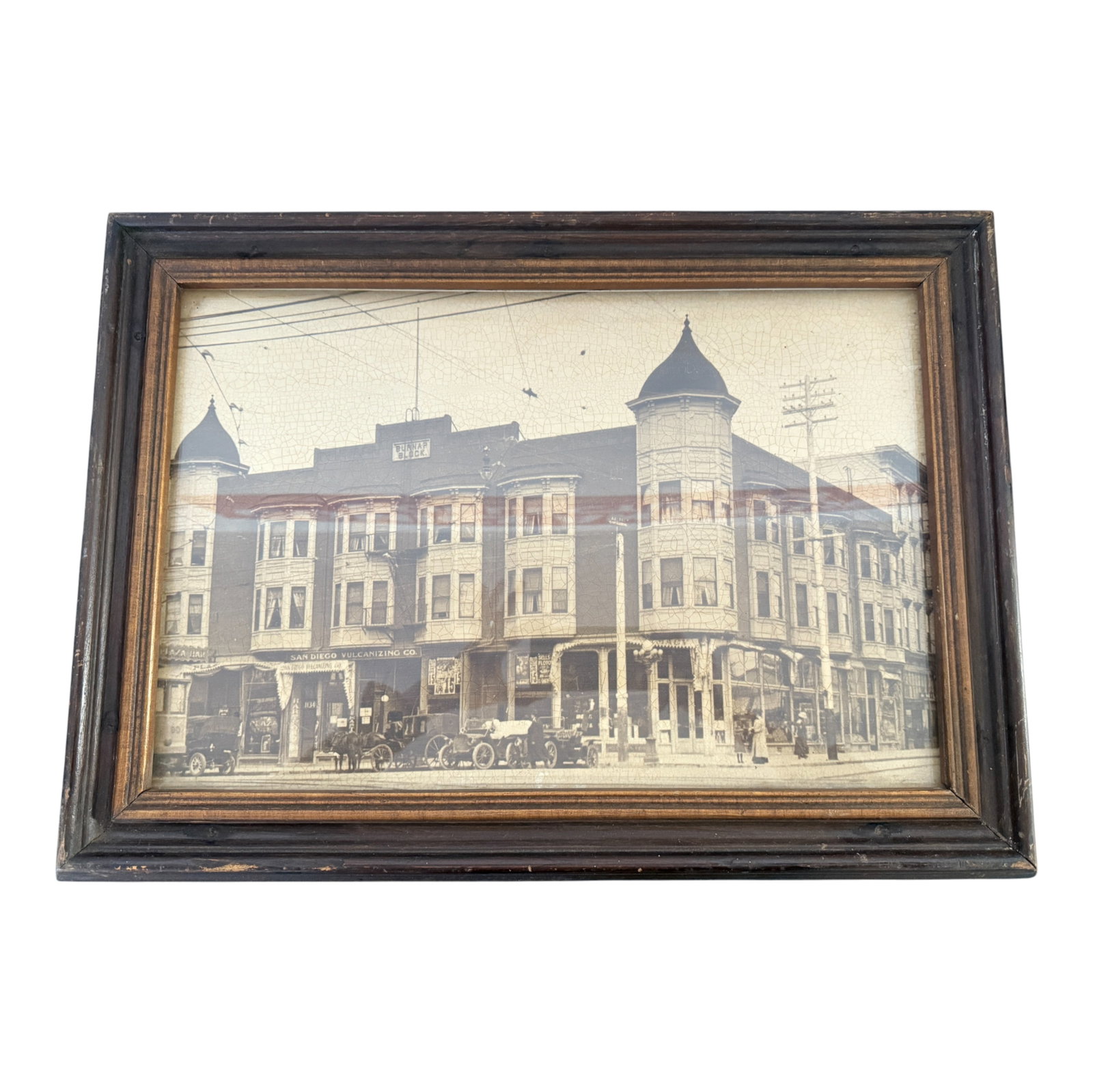 Antique Framed Photograph San Diego Street Scene: Antique framed photograph depicting early 20th-century San Diego street scene with storefronts and automobiles. Private collector item.