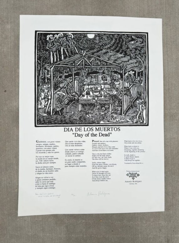 Dia de los Muertos / Day of the Dead – Serigraph with Poem, Artemio Rodríguez, 1996: Black and white serigraph on paper by renowned Mexican printmaker Artemio Rodríguez, created in 1996. The work depicts a traditional Day of the Dead altar scene under the moonlight, with skeletal fig