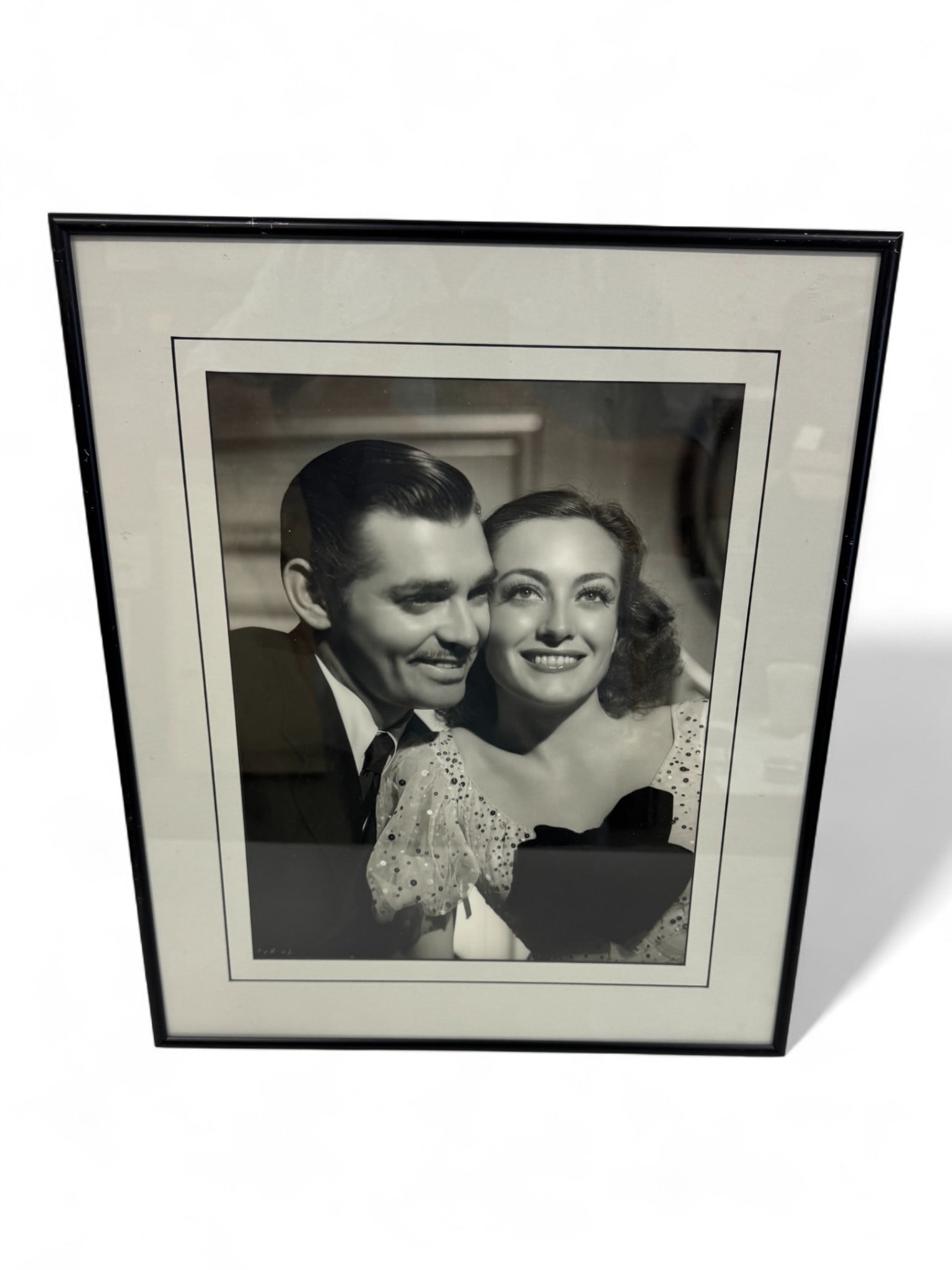 George Hurrell Signed - Silver Gelatin Photograph of Clark Gable and Joan Crawford: George Hurrell Signed - Silver Gelatin Photograph of Clark Gable and Joan Crawford. Size with frame: 16" x 19". Size of photo: 8" x 10".