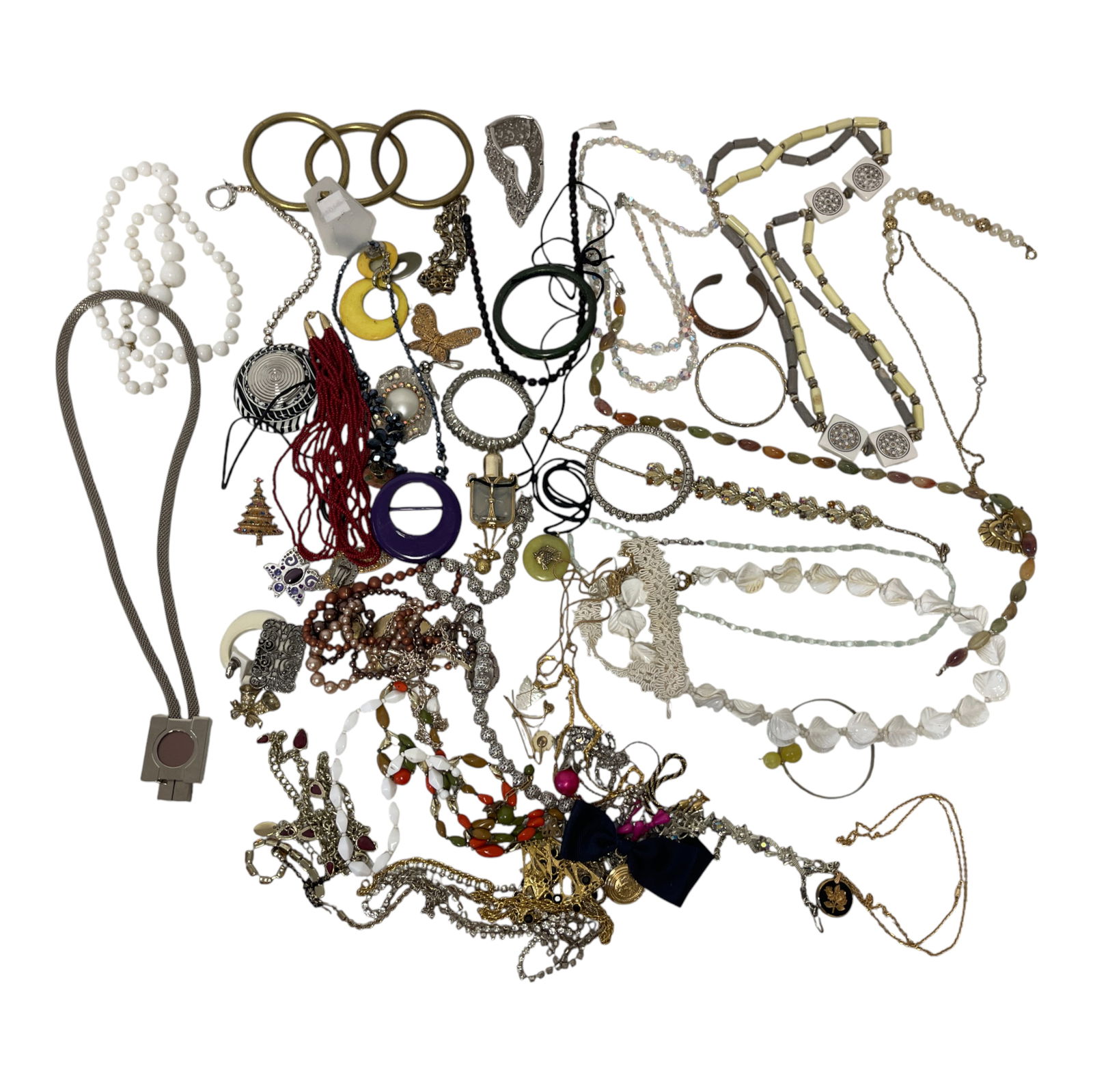 Assorted Vintage Necklaces and Costume Jewelry: Collection of costume jewelry featuring necklaces, pendants, earrings, and bracelets. Includes colorful beaded strands, enamel and metalwork, and statement pieces.