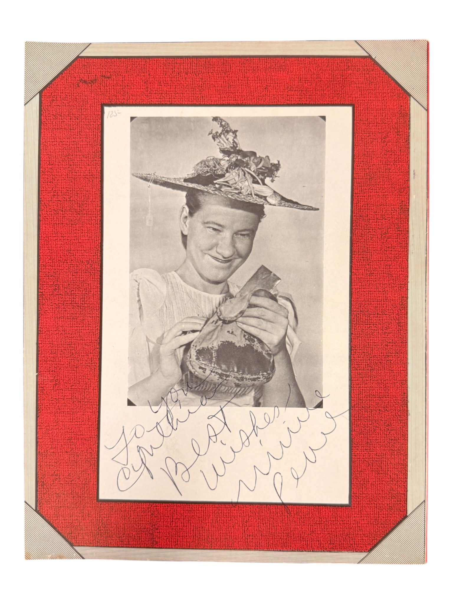 Minnie Pearl Signed Vintage Photo: Original signed photograph of Minnie Pearl with humorous pose and handwritten inscription 'To you with best wishes, Minnie Pearl.' Presented in a red border mount. Authentic vintage country entertaine