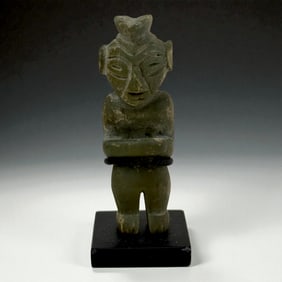 Carved Stone Masked Standing Figure