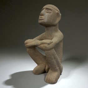 West African Seated Stone Figure