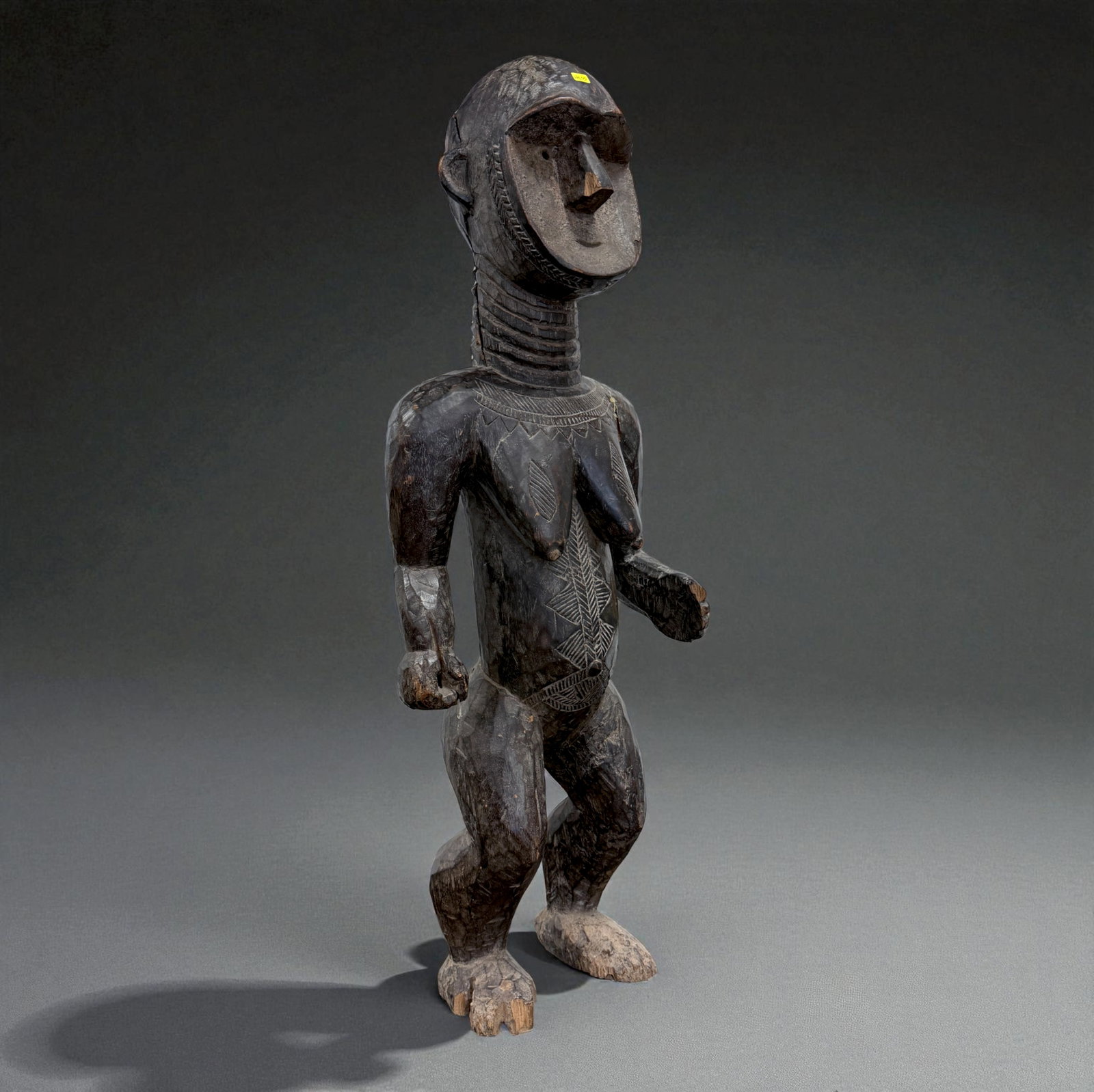 Central African Dual-Spirit Shrine Figure: Central African Dual-Spirit Shrine Figure. Traditional carved form typical of 19th–20th Century regional African craftsmanship. Provenance: Beverly Hills Barakat Gallery Collection. 41" inches