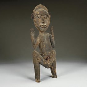 African Squatting Female Figure