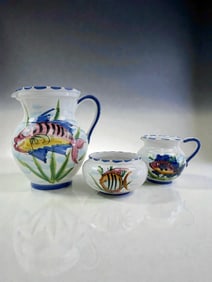 Set of Three Hand Painted Ceramic Pitchers with Fish Motifs Italy