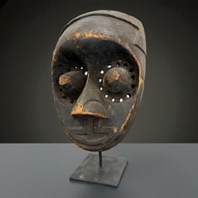 African Carved Mask with Pierced Eyes