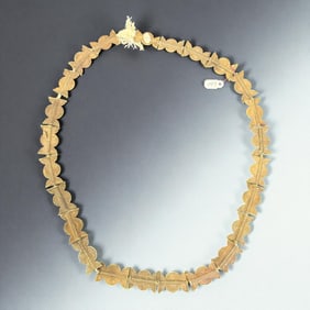 Carved Currency Necklace