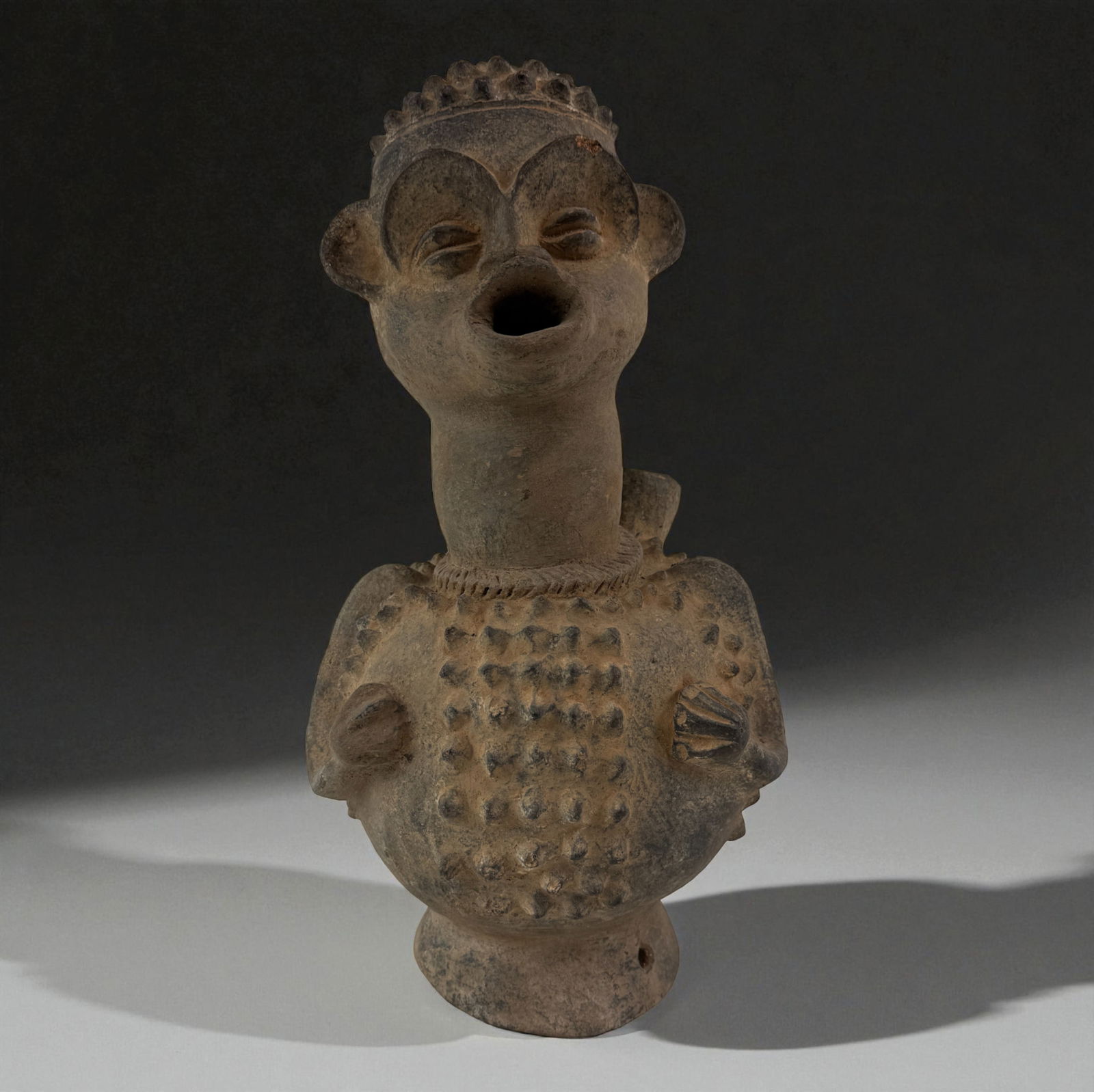 African Terracotta Pottery Vessel: African Terracotta Pottery Art Provenance: Beverly Hills Barakat Gallery Collection. 19.5"