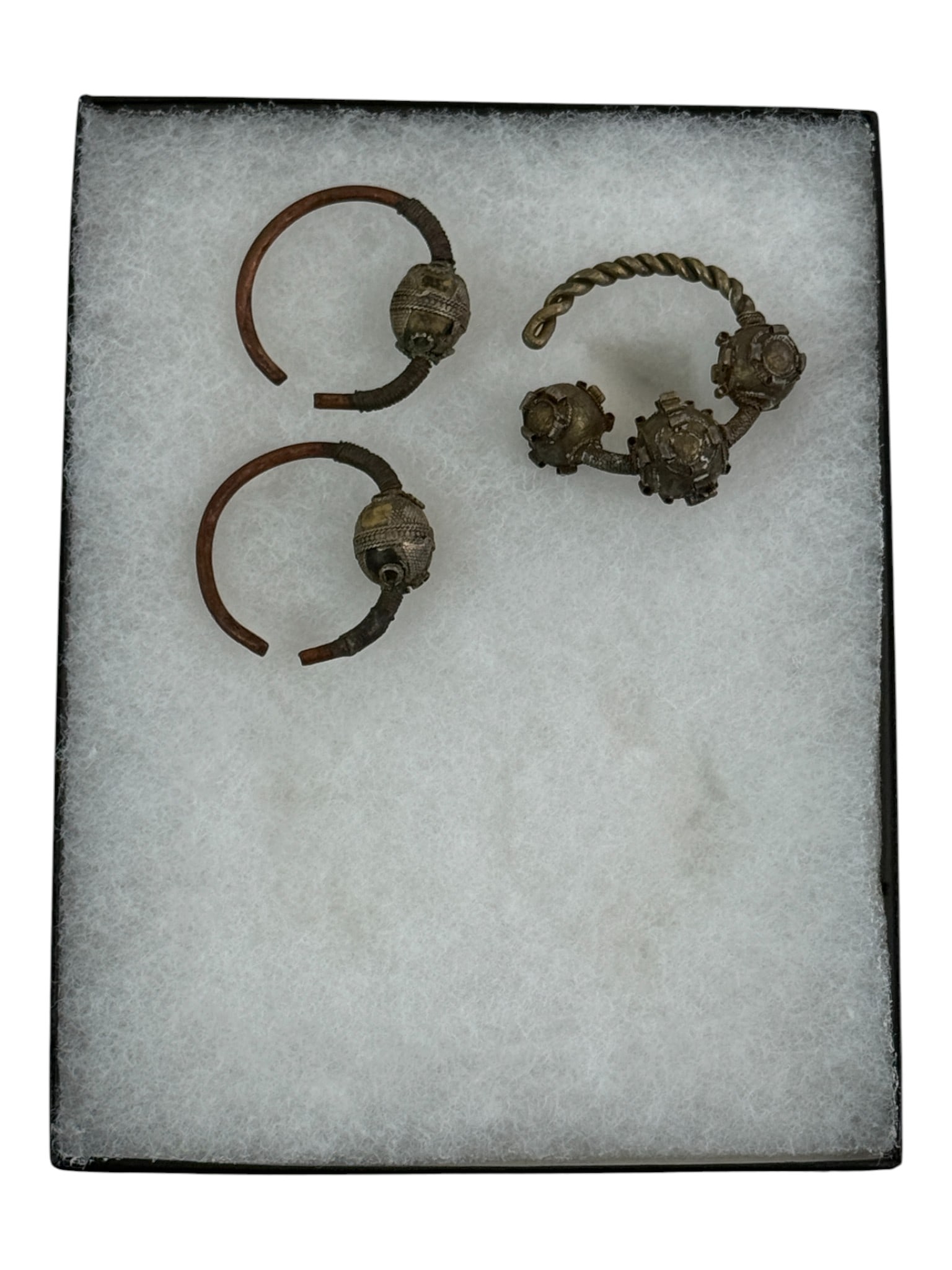 Metal Bracelet and Ornament Group: Group of metal bracelets and ornaments with decorative bead elements. Condition varies with oxidation and wear.