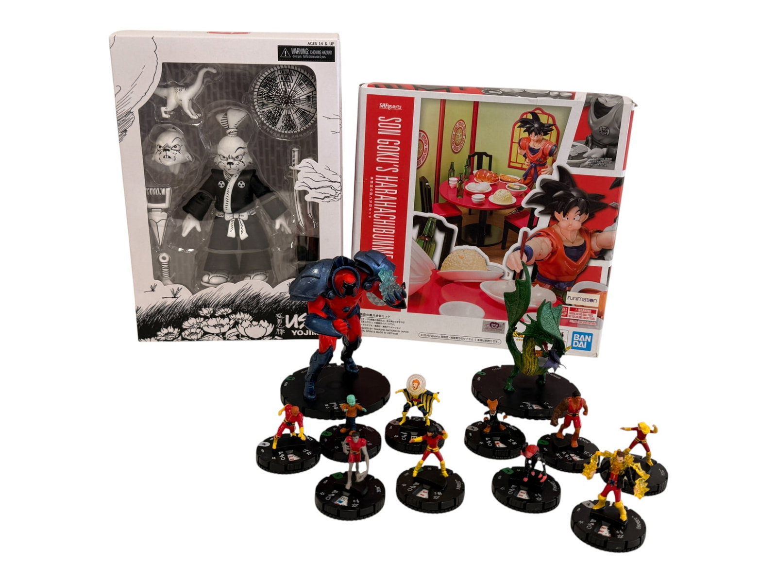 Mixed Japanese Designer Figures Lot: Group lot of Japanese collectible figures including boxed anime characters and mini figures. Condition varies.