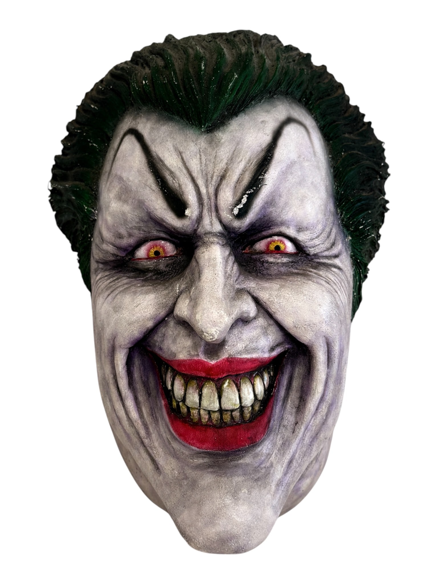 Joker Life-Size Mask: Detailed Joker character mask with painted features. Condition consistent with display use.