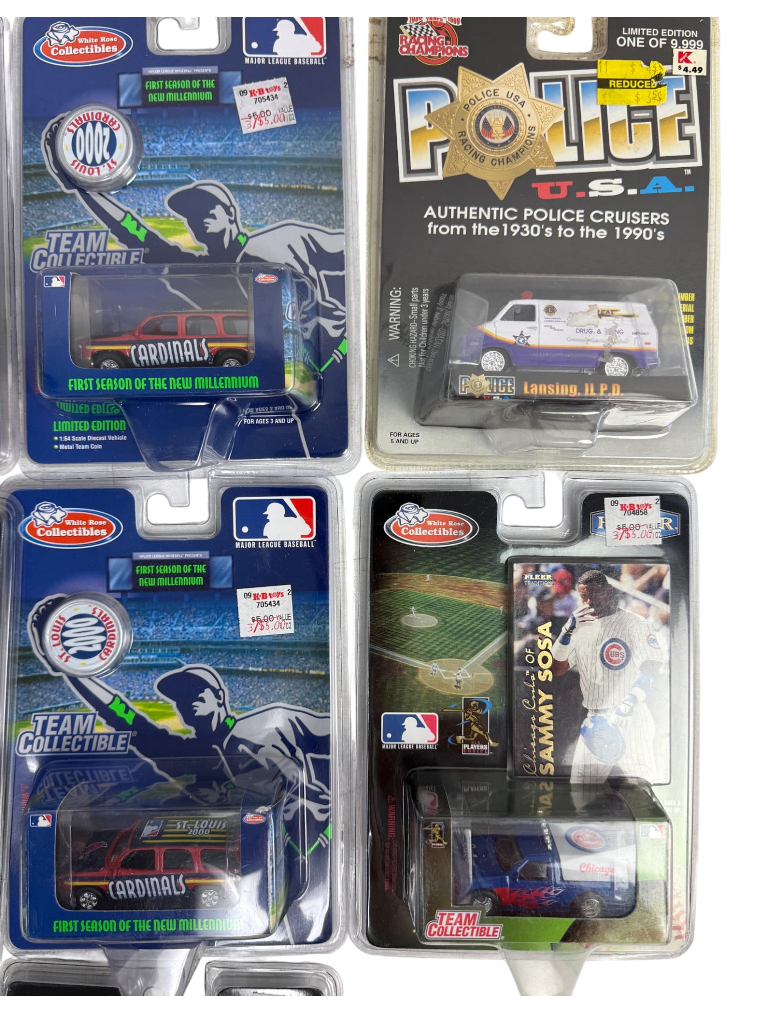 MLB Team Collectible Die-Cast Vehicles: Group of MLB team collectible die-cast vehicles including St. Louis Cardinals examples. Carded packaging with visible shelf wear.