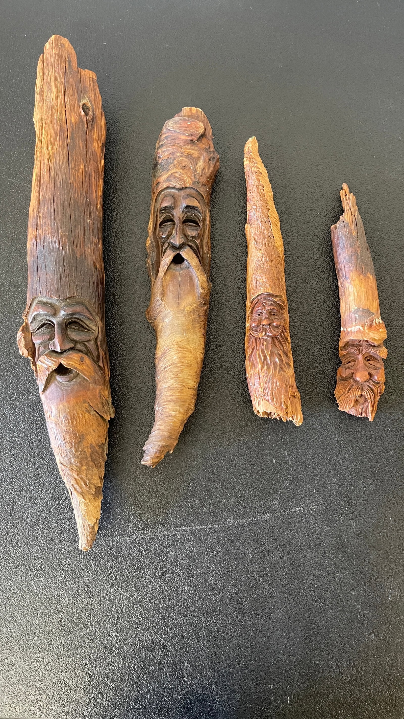 Folk Art Carved Wood Spirit Faces on Driftwood Branches: Folk Art Carved Wood Spirit Faces on Driftwood Branches