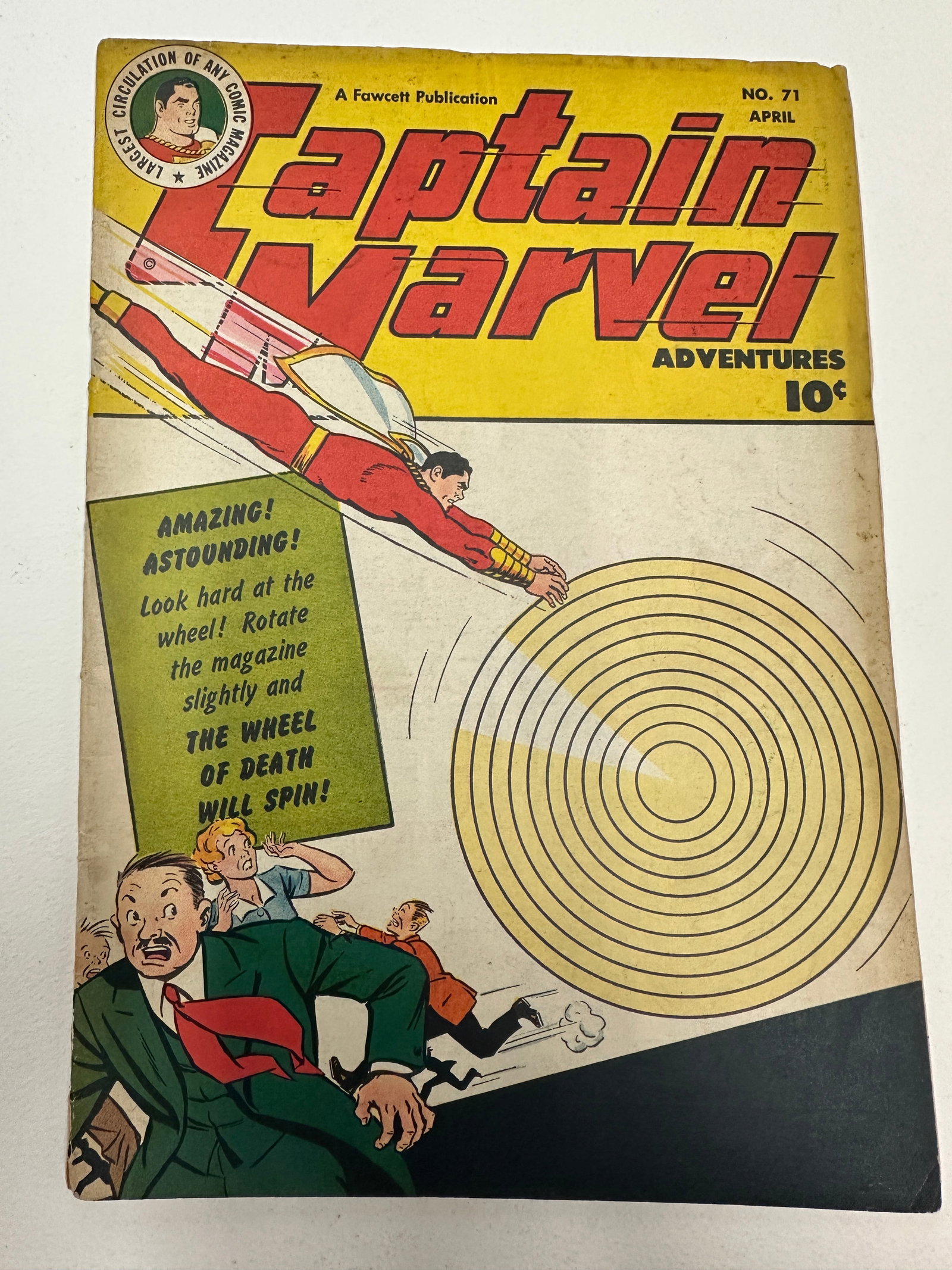 Captain Marvel Adventures #71, Fawcett Publications, April 1947: Captain Marvel Adventures No. 71, published by Fawcett Publications, April 1947, priced at 10 cents. This Golden Age superhero comic features a striking cover depicting Captain Marvel flying toward a 