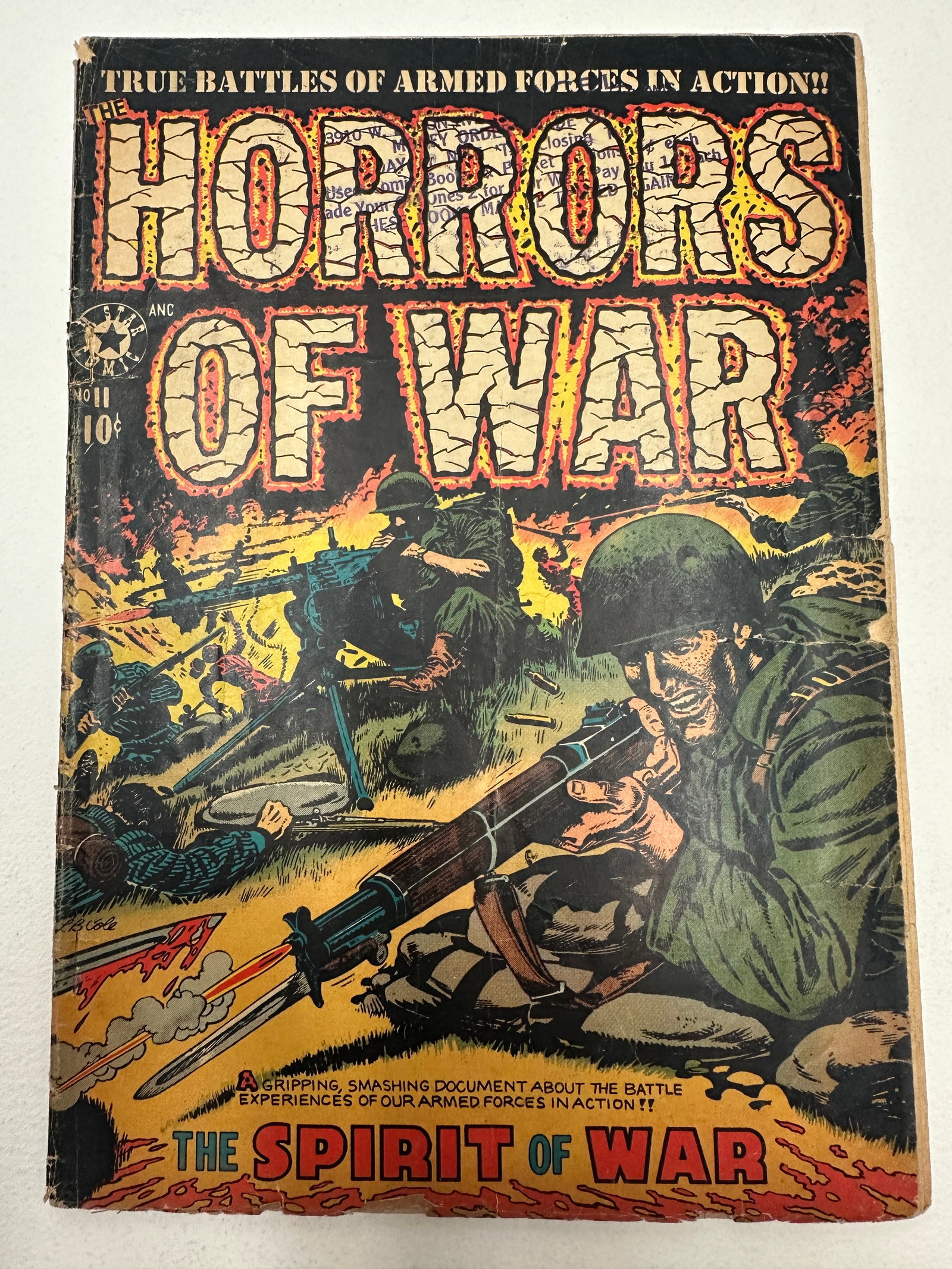 Horrors of War #11 Star Publications 1952 Golden Age War Comic 10¢: A Golden Age war comic book published by Star Publications, 'Horrors of War' issue #11, priced at 10 cents and featuring the story 'The Spirit of War.' The cover art depicts intense WWII battlefield c