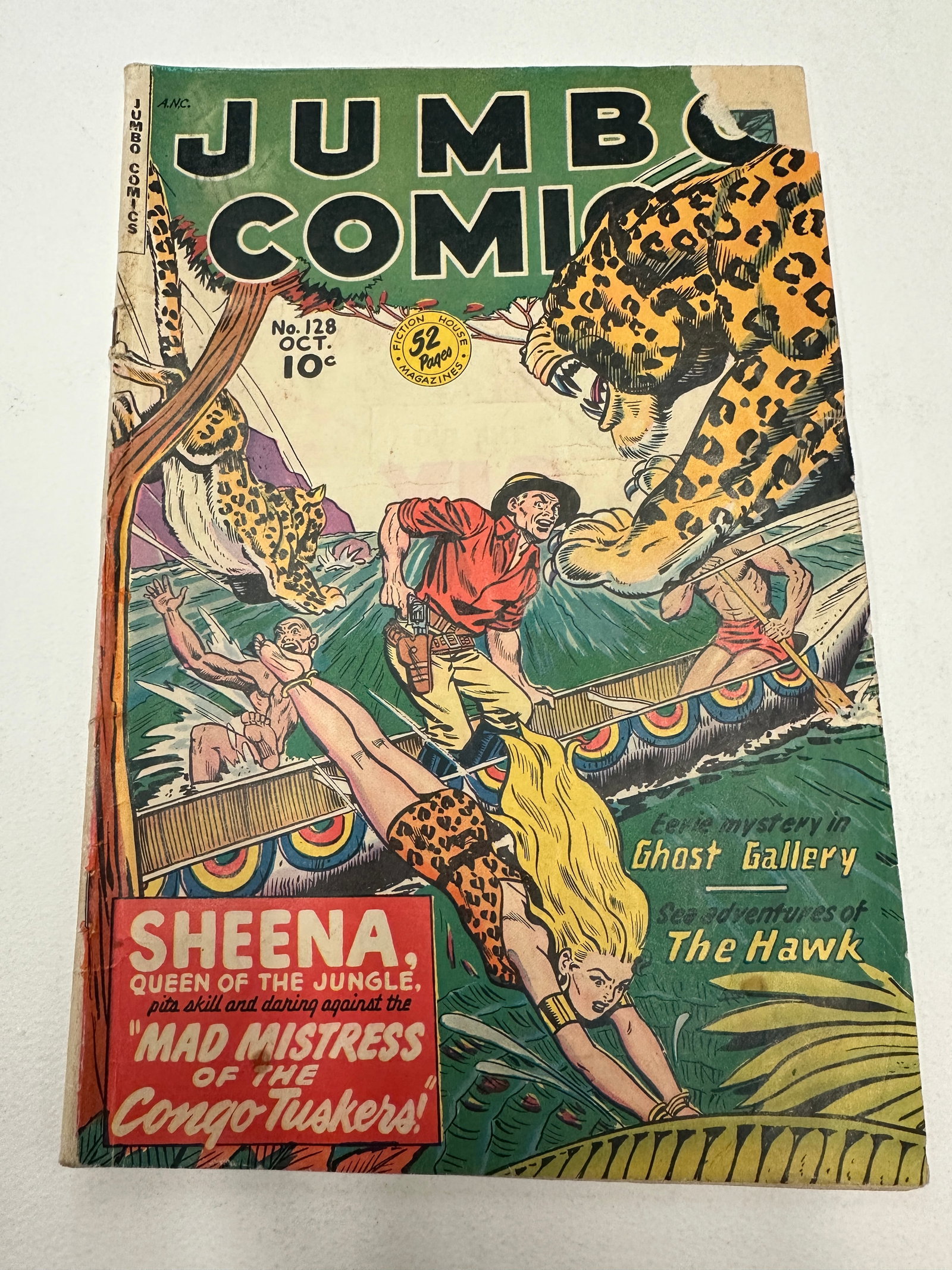 Jumbo Comics #128 (Fiction House, Oct 1949) Sheena Queen of the Jungle: Jumbo Comics #128, published by Fiction House in October 1949, featuring Sheena, Queen of the Jungle in the story 'Mad Mistress of the Congo-Tuskers.' This Golden Age comic also includes features 'Gho