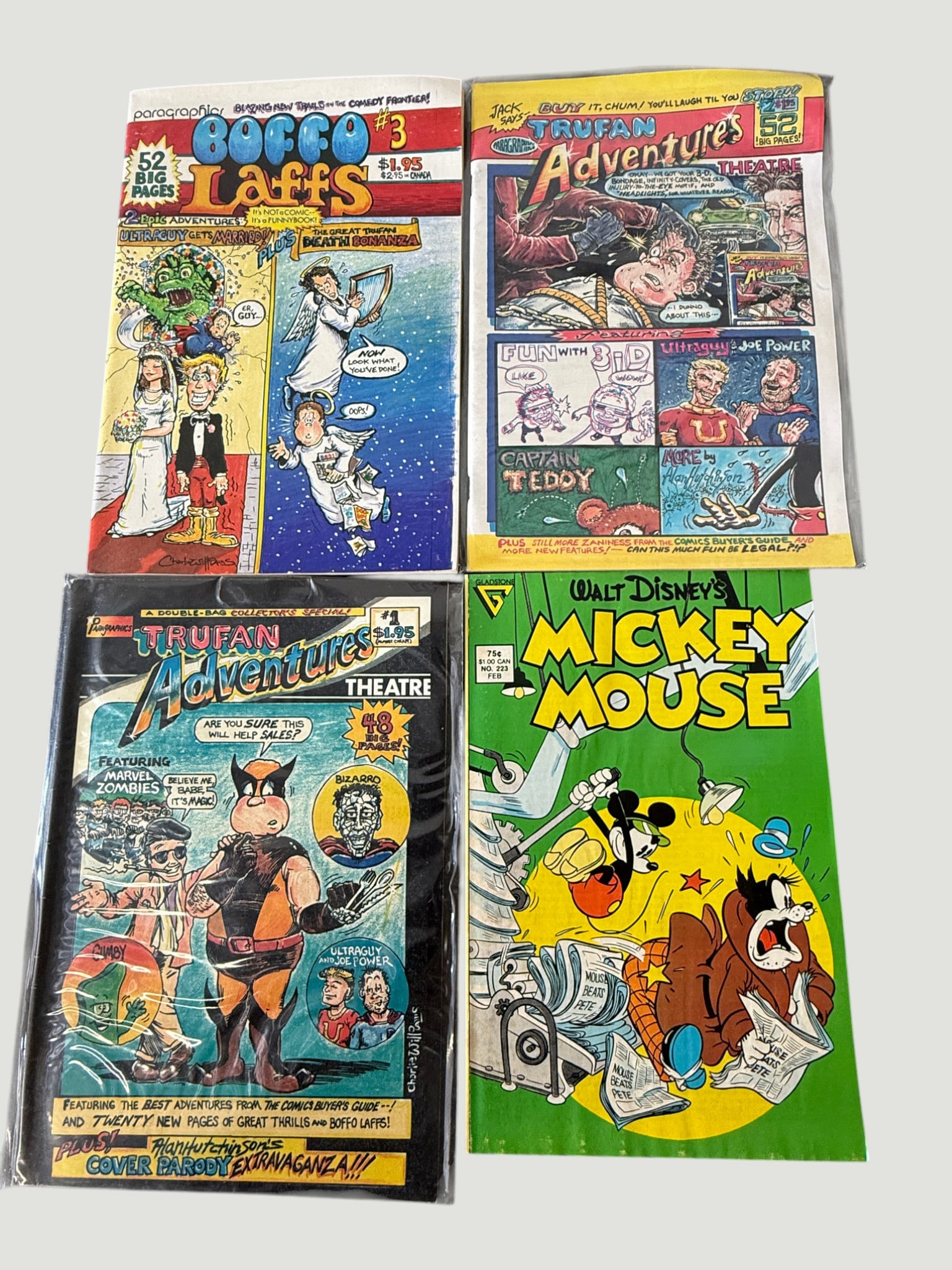 Lot of 4 Vintage Comedy/Parody Comics incl. Mickey Mouse, Trufan Adventures, Boffo Laffs (1 of 2)