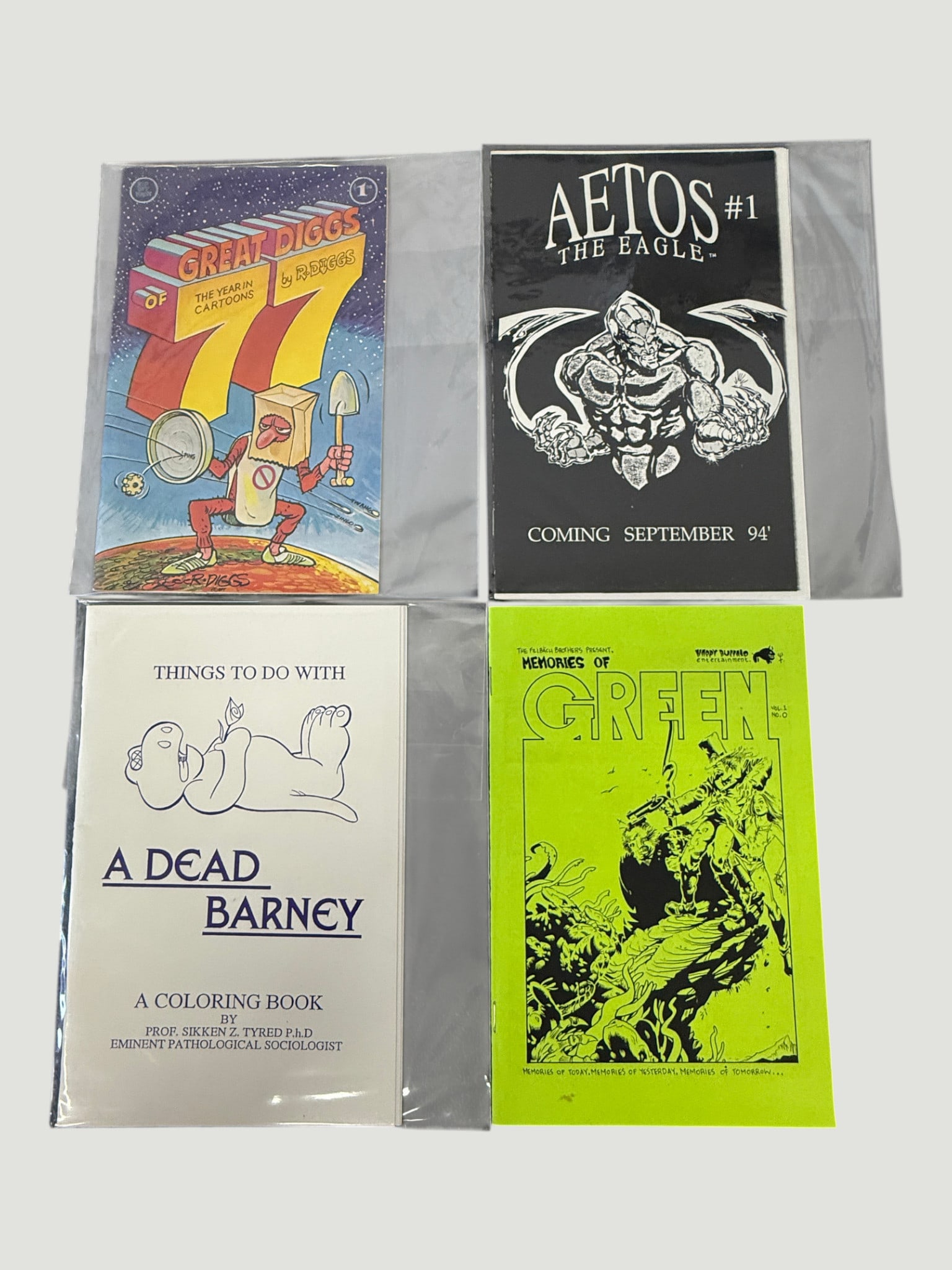 Lot of 4 Underground/Indie Comics: Great Diggs, Aetos #1, Dead Barney, Memories of Green: A collection of four rare small-press and independent publications from the early-to-mid 1990s, each bagged in protective sleeves. Includes 'Great Diggs of 77: The Year in Cartoons' by R. Diggs, an ea