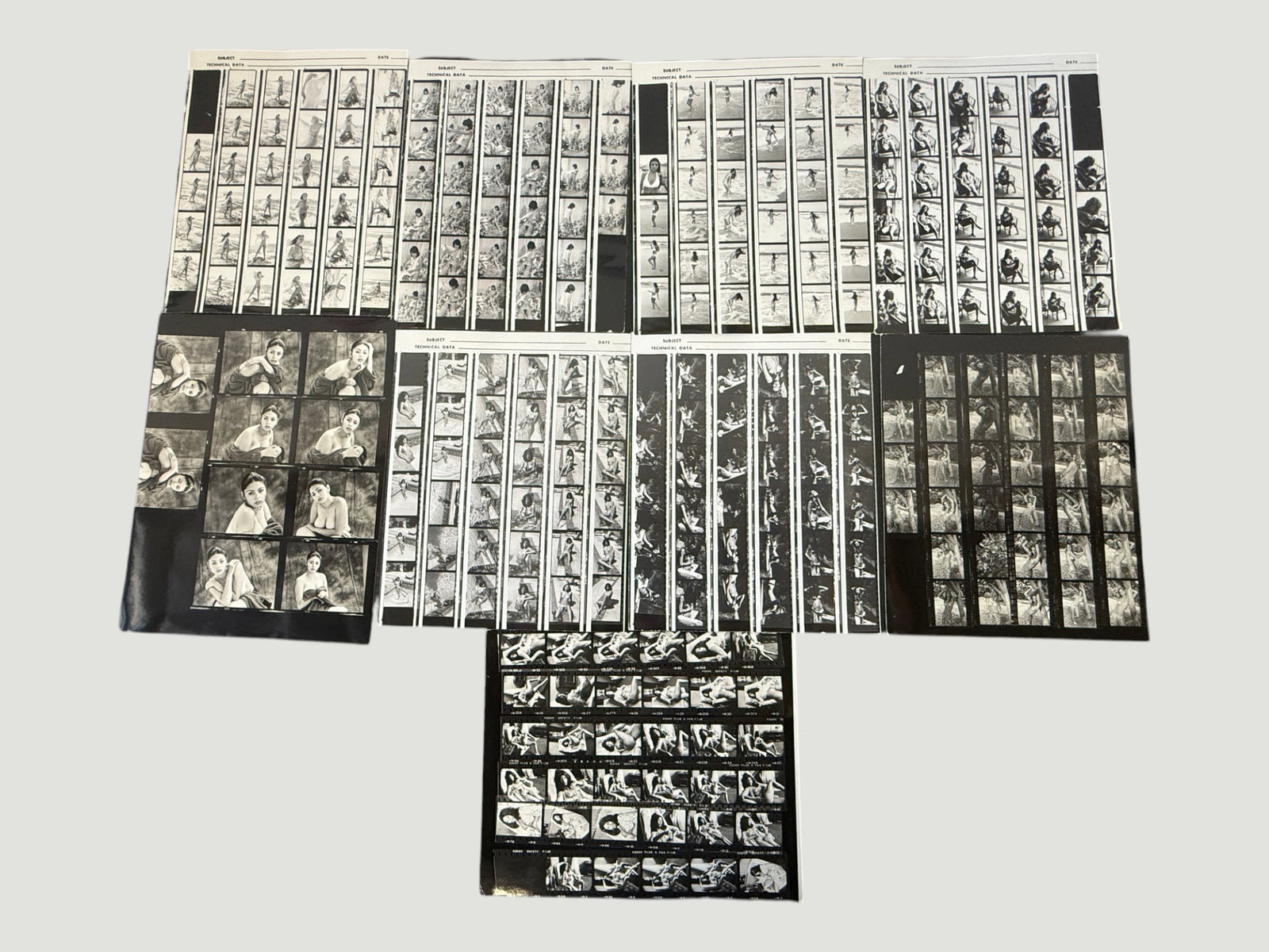 Vintage B&W Photography Contact Sheets, Female Figure Studies, c.1970s-80s: A collection of approximately 9 black and white photographic contact sheets depicting female figure and portrait studies, consistent with professional or semi-professional photography work from the 19
