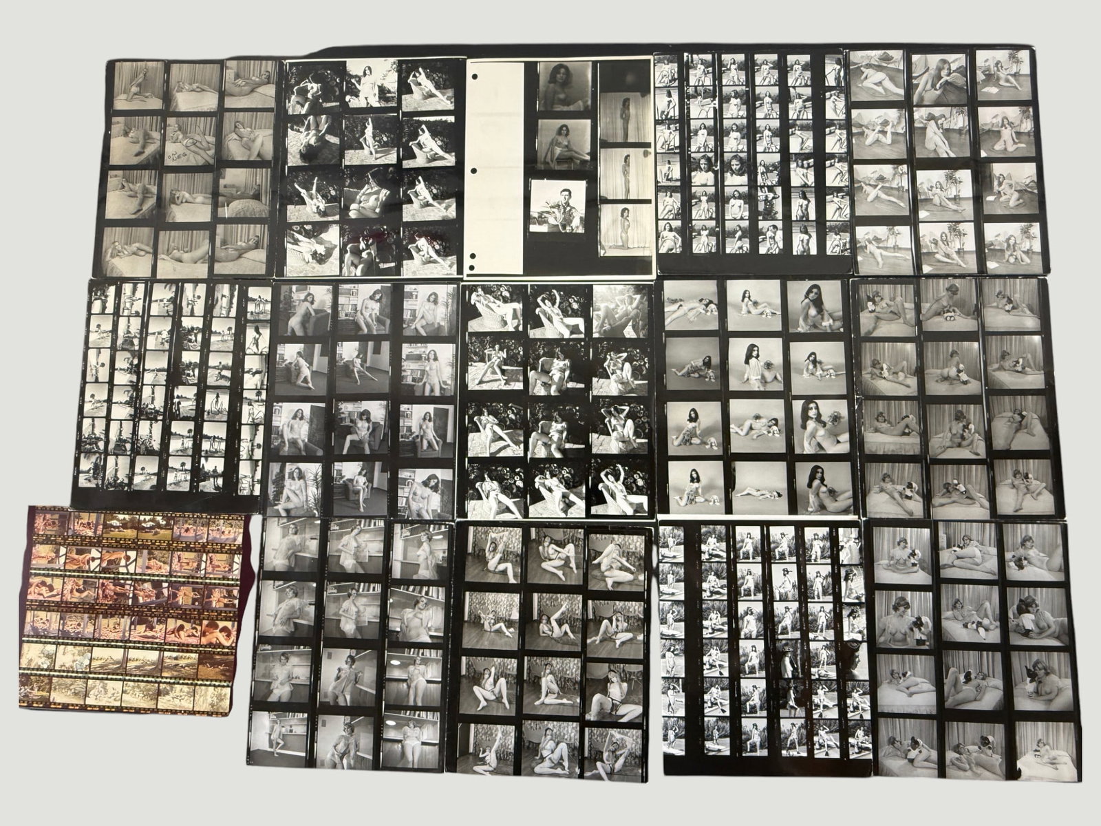Vintage B&W Photography Contact Sheets & Color Film Strips, c.1970s Adult Figure Studies: A substantial collection of vintage photographic contact sheets and color film strips, approximately 1970s era, depicting adult figure/nude photography sessions. The lot includes approximately 15-20 b