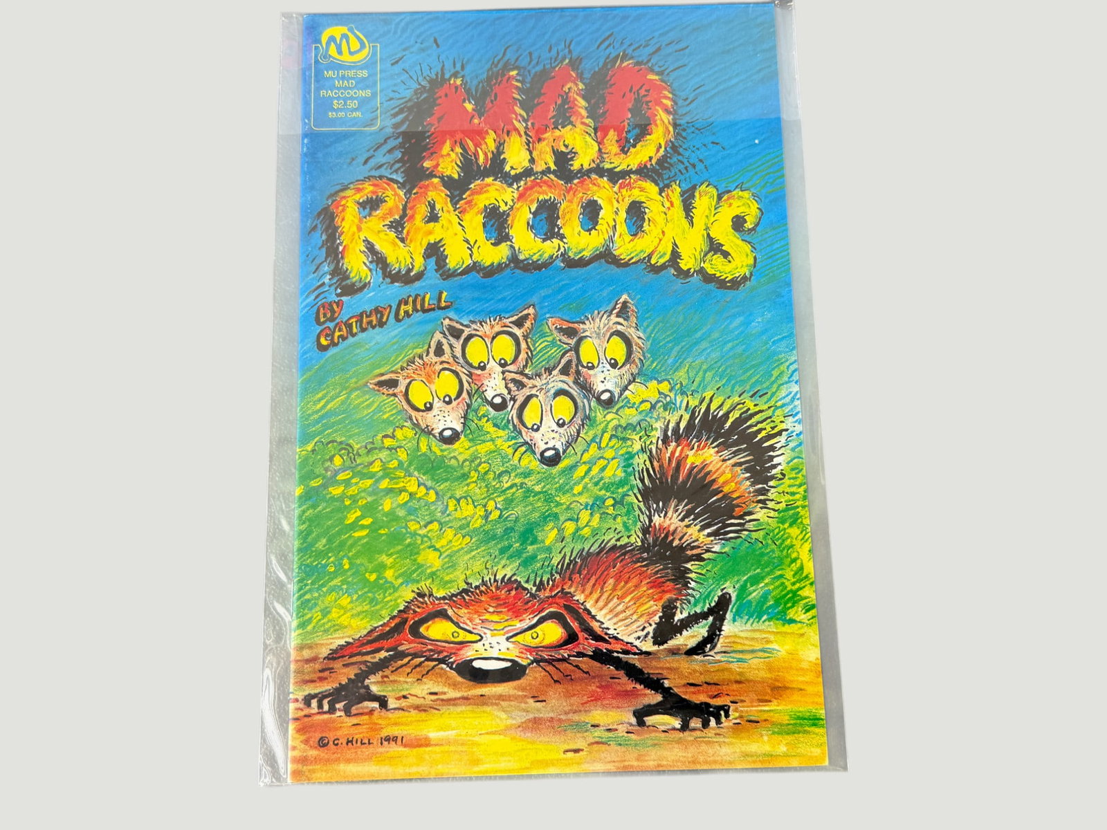 Mad Raccoons #1 MU Press 1991 Cathy Hill Underground Indie Comic: Mad Raccoons #1, published by MU Press in 1991, written and illustrated by Cathy Hill. This is a rare independent/small press comic featuring Hill's distinctive, expressive artwork depicting wildly ch
