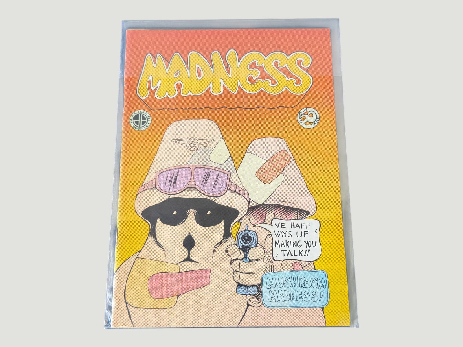 Madness 'Mushroom Madness' Underground Comix, FA-Q Features/Quickbook, c.1970s: A copy of 'Madness' underground comix featuring the 'Mushroom Madness' story, published by FA-Q Features/Quickbook and priced at 50 cents on the cover. The cover art depicts anthropomorphic mushroom c