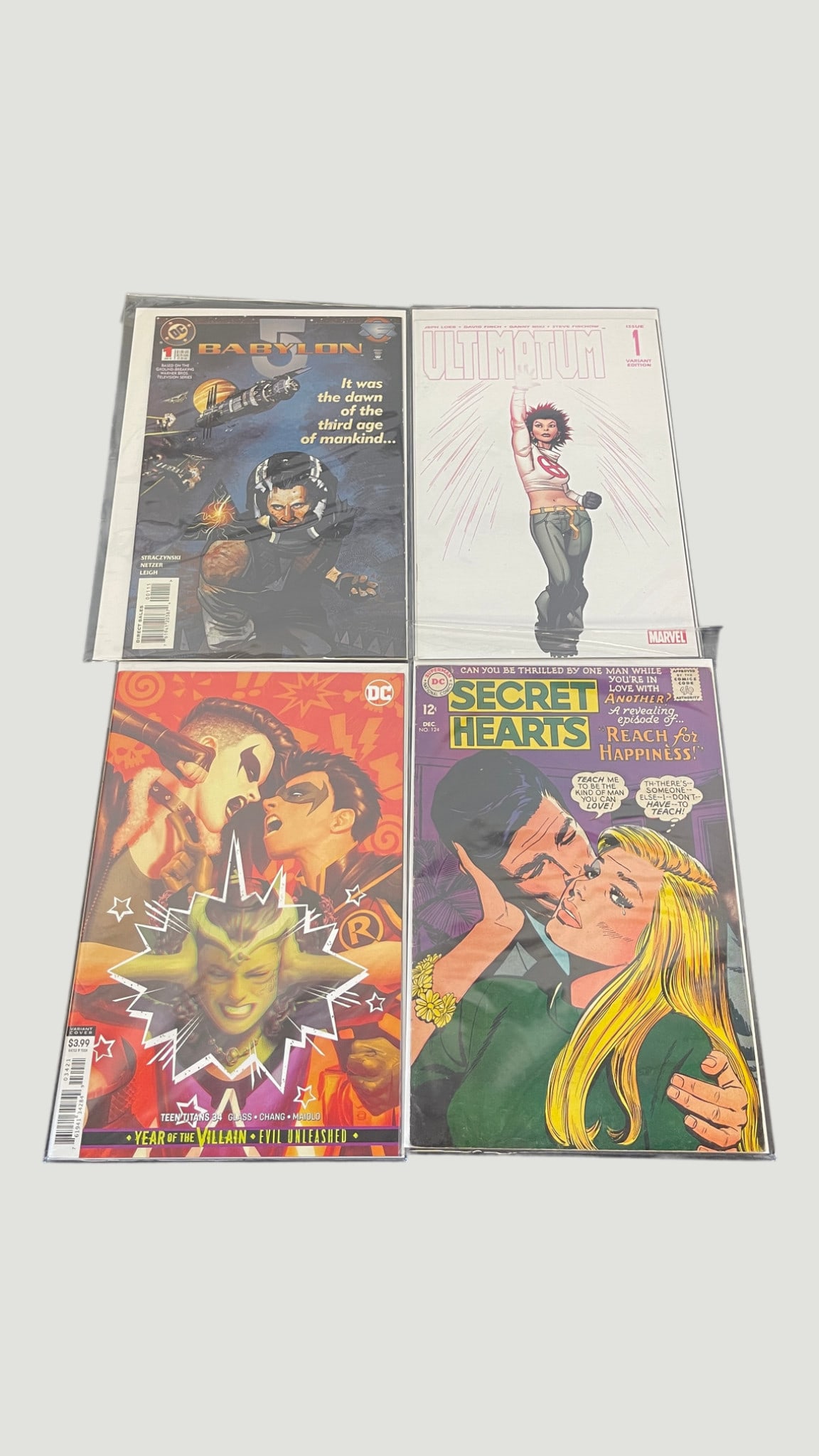 Mixed Comic Lot: Babylon 5 #1, Ultimatum #1 Variant, Teen Titans #34, Secret Hearts (1 of 1)
