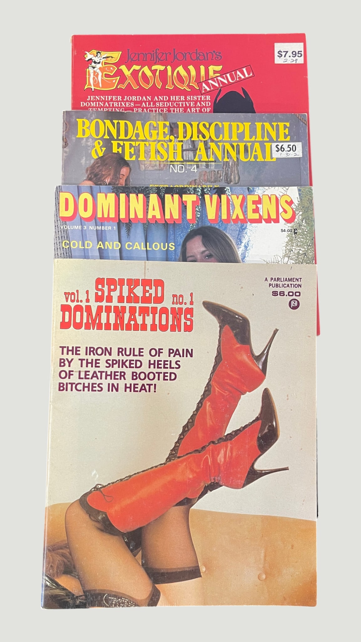 Vintage Adult Fetish Magazines x4 — Spiked Dominations, Dominant Vixens & More: A collection of four vintage adult fetish/BDSM-themed magazines from the late 1970s to mid-1980s, comprising: 'Spiked Dominations' Vol.1 No.1 (Parliament Publication, $6.00 cover price); 'Dominant Vix