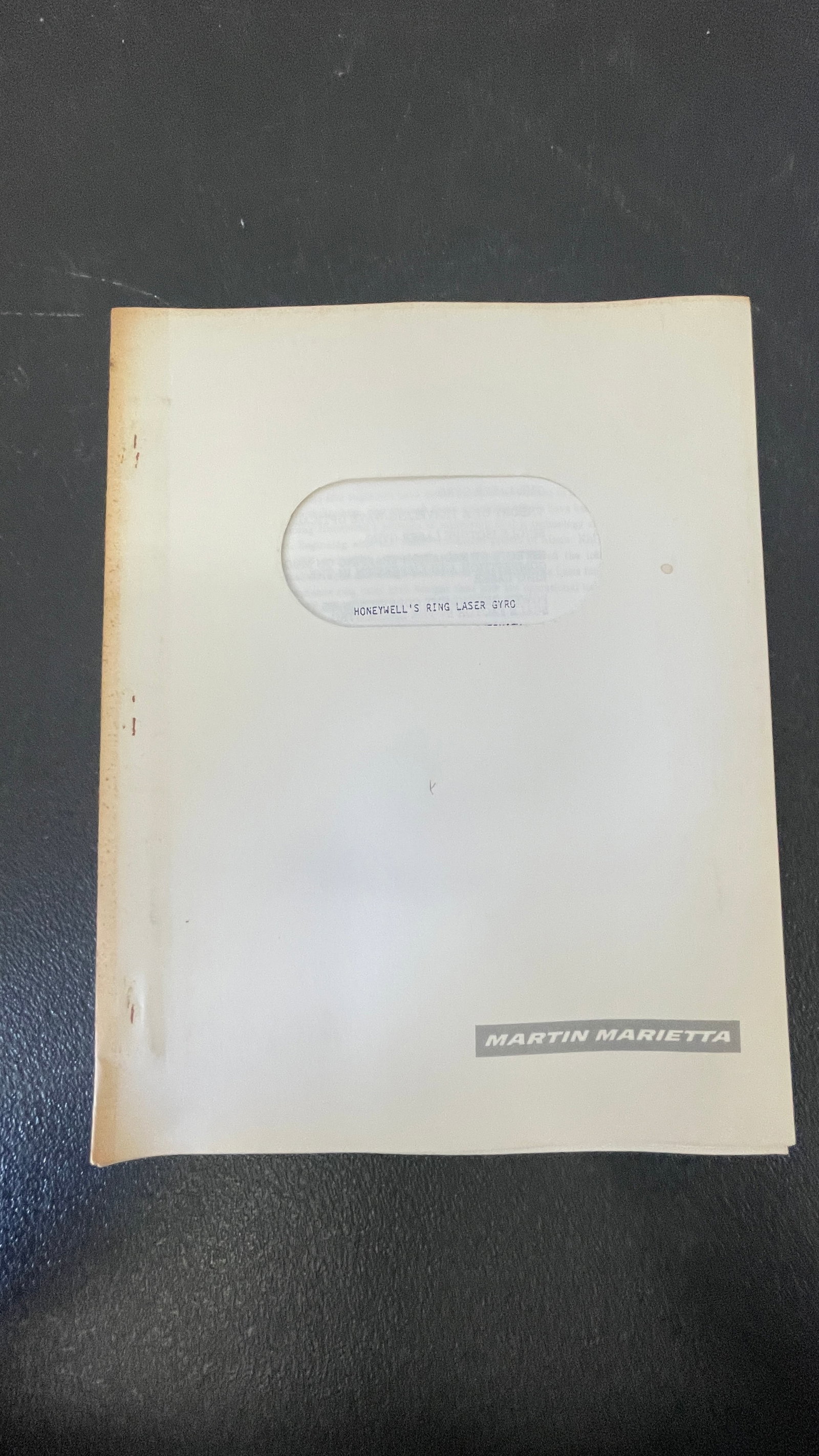 Martin Marietta / Honeywell Ring Laser Gyro Vintage Technical Document: A vintage technical or promotional document produced by Martin Marietta, a major American aerospace and defense corporation, relating to Honeywell's Ring Laser Gyro technology. The document features