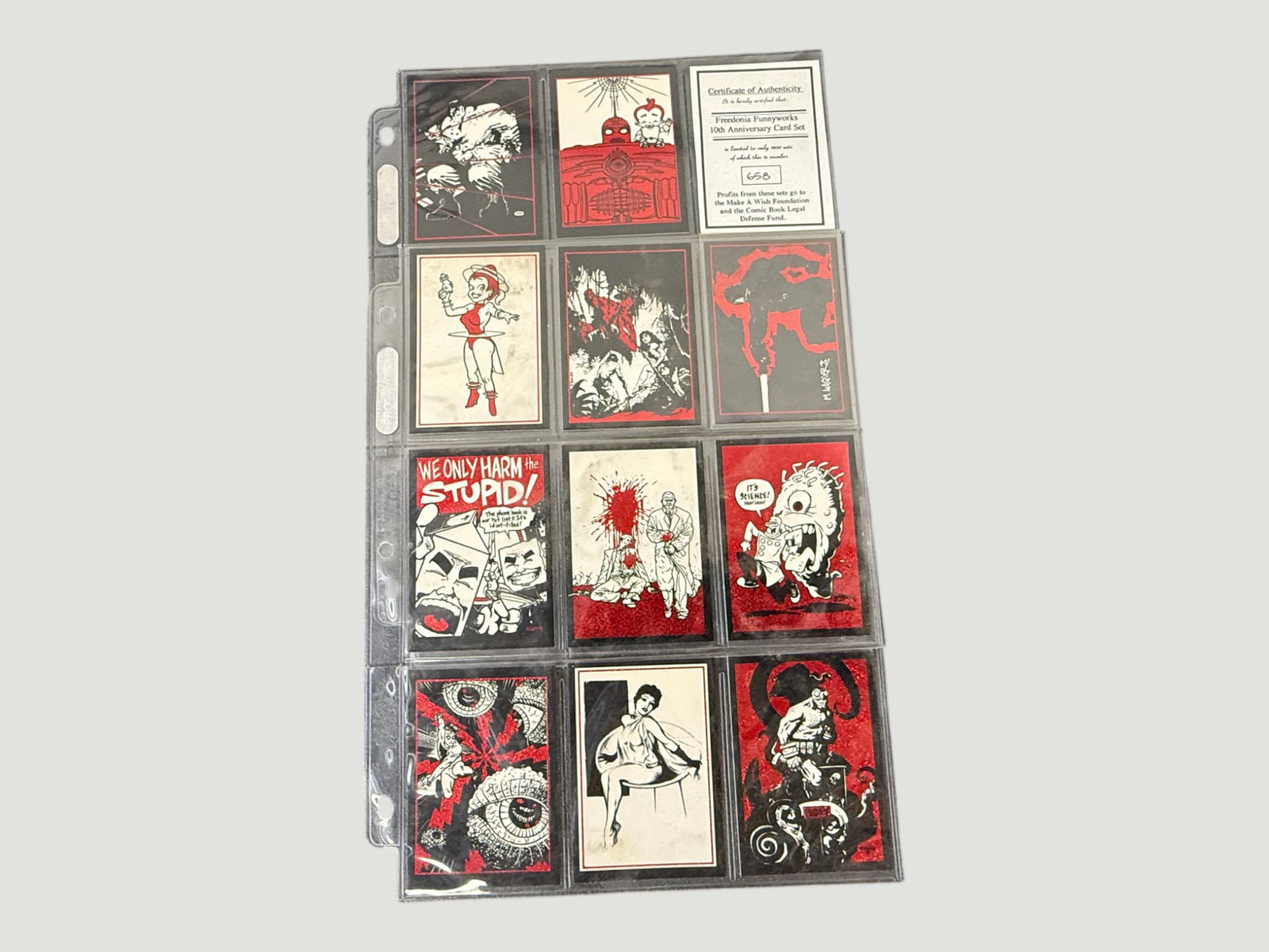 Freedonia Funnyworks 10th Anniversary Card Set #658 – Limited Edition Art Cards: A complete limited edition trading card set from Freedonia Funnyworks, presented in a plastic collector's binder page, numbered 658 of only 1000 sets produced, accompanied by a Certificate of Authenti