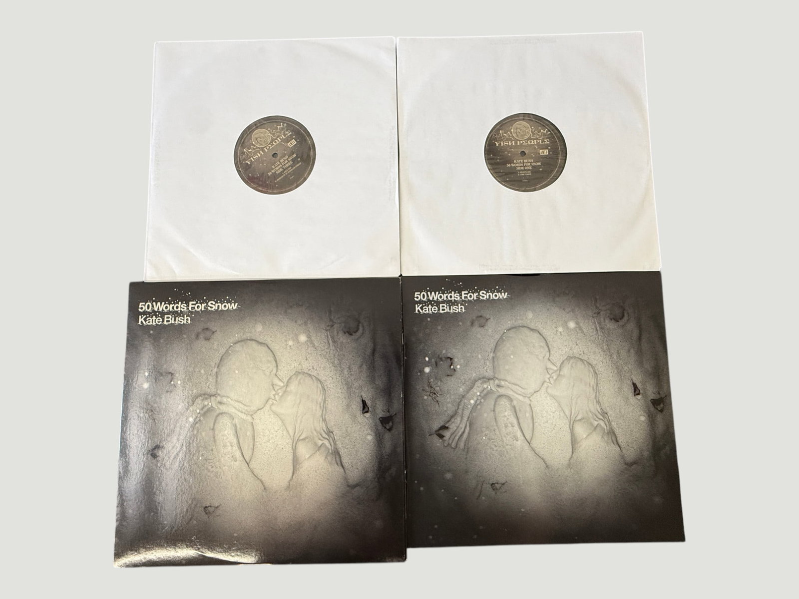 Kate Bush '50 Words For Snow' Double Vinyl LP x2 Copies – Fish People Records: Two copies of Kate Bush's 2011 album '50 Words For Snow', presented as a double LP set on her own Fish People Records label. Each copy features the distinctive dark artwork depicting snow-sculpted fig