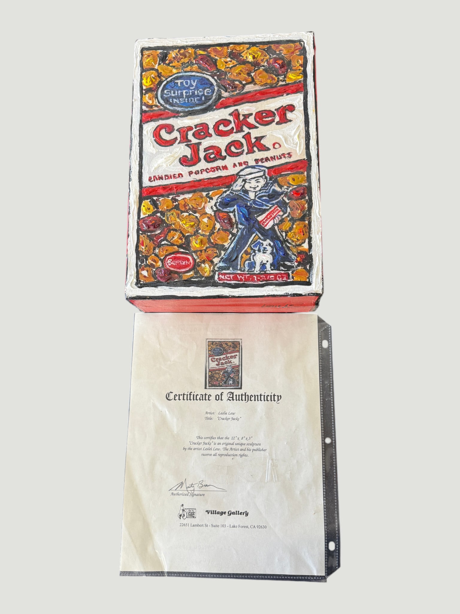 Leslie Lew 'Cracker Jacks' Original Unique Sculpture 12x8x3" w/ COA Village Gallery: An original unique sculptural artwork by artist Leslie Lew, titled 'Cracker Jacks,' measuring 12" x 8" x 3". The piece is a three-dimensional painted sculpture depicting a classic Cracker Jack box, co